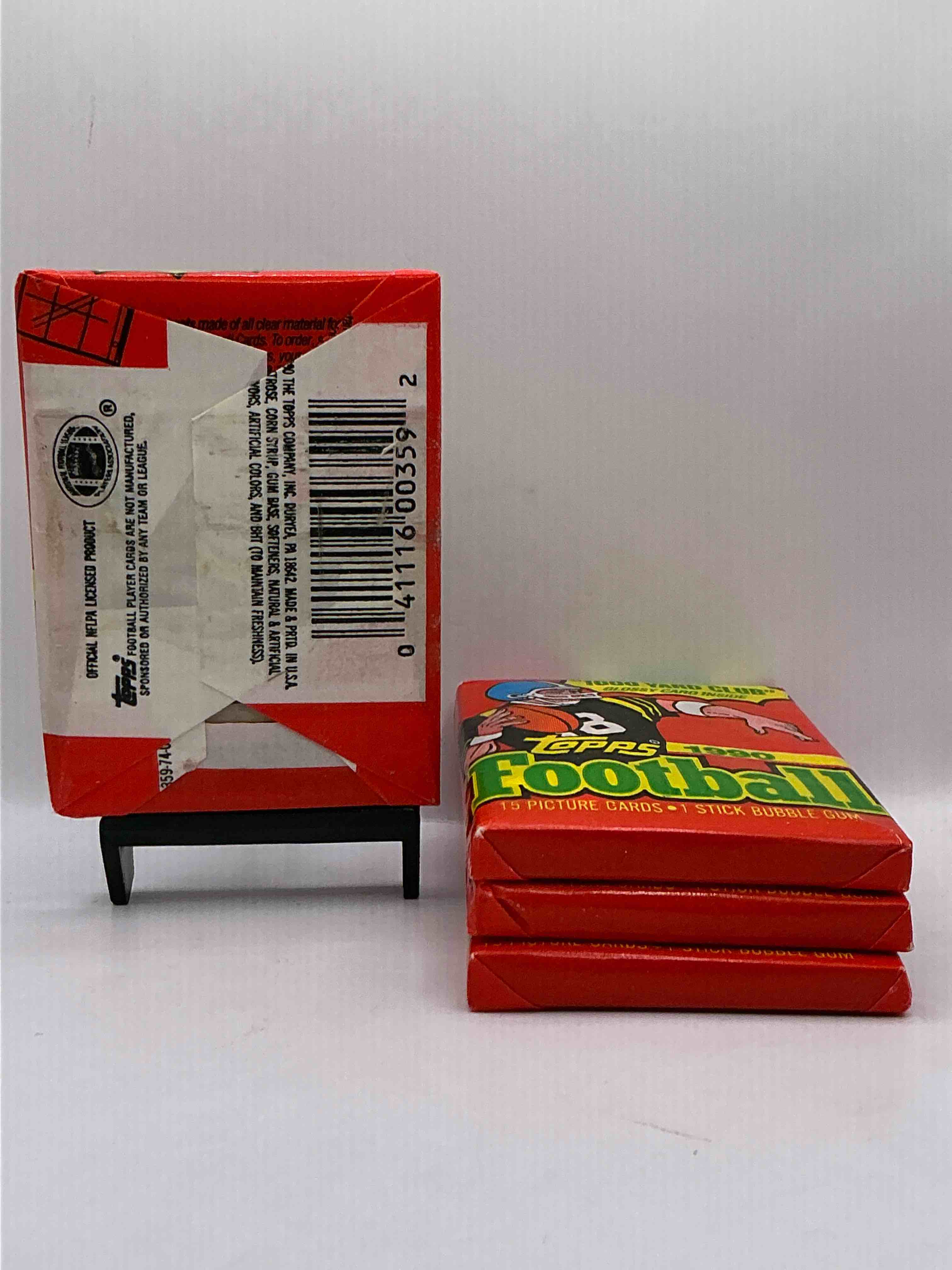 Condition photo showing New/Like New for The Last Year Of Football Wax! Joe Montana, Emmitt Smith & Barry Sanders!? 1990 Topps Football Unopened Sports Card Wax Pack, Direct From Original Retail Box! Getting Hard To Find! Search For Early Barry Sanders & Jerry Rice & So Much More!