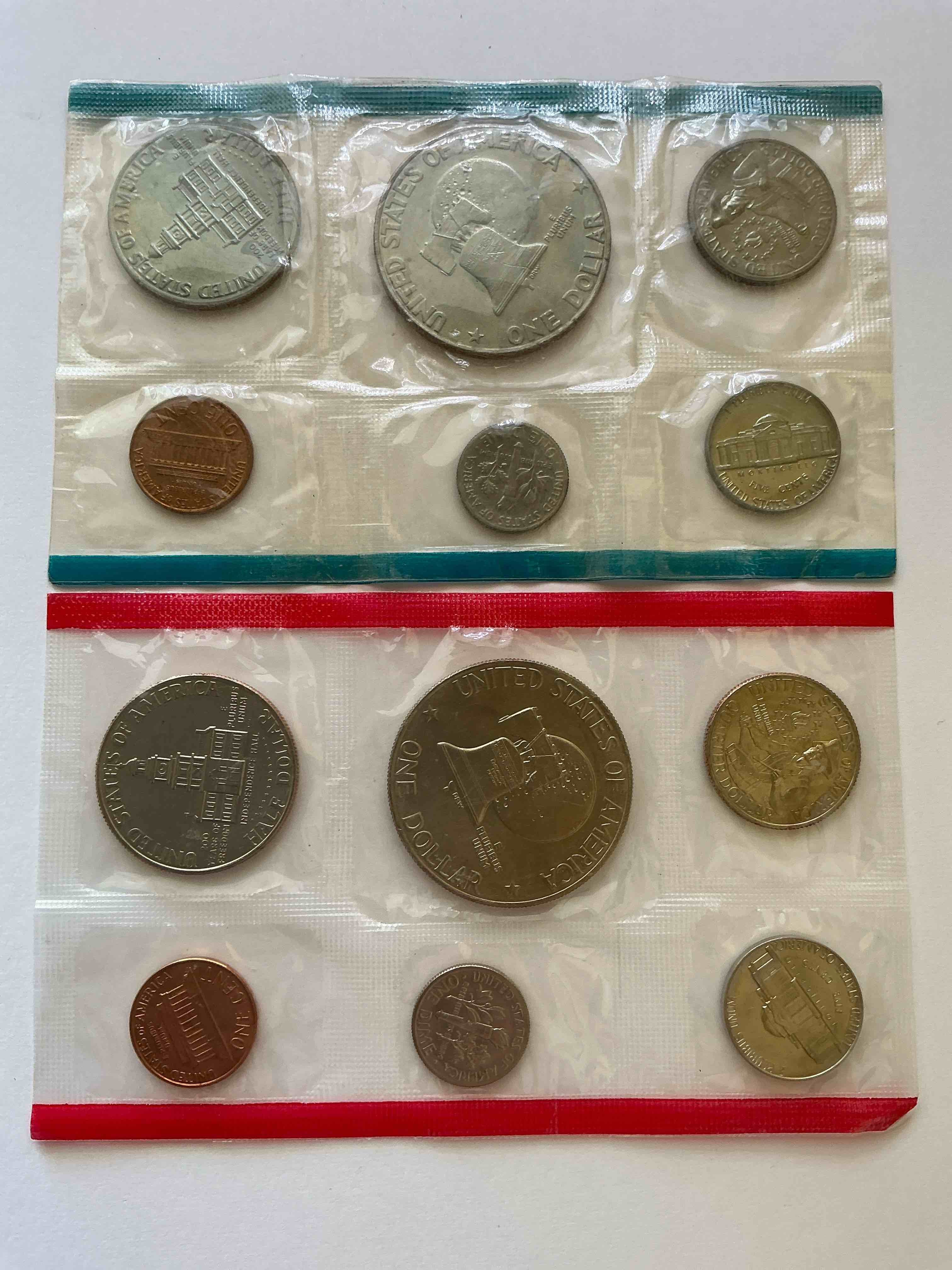 Condition photo showing New/Like New for 1976 Bicentennial Bliss! In 1976 The U.S. Mint Set Celebrating The 200 Year Anniversary Of America! 12 Coin Set Including Bicentennial Quarters, IKEs, Kennedy Halves & Pennies! Highly Desirable For Collectors! Own Pieces Of History & Celebrating America's 250 Year Anniversary Coming Soon!