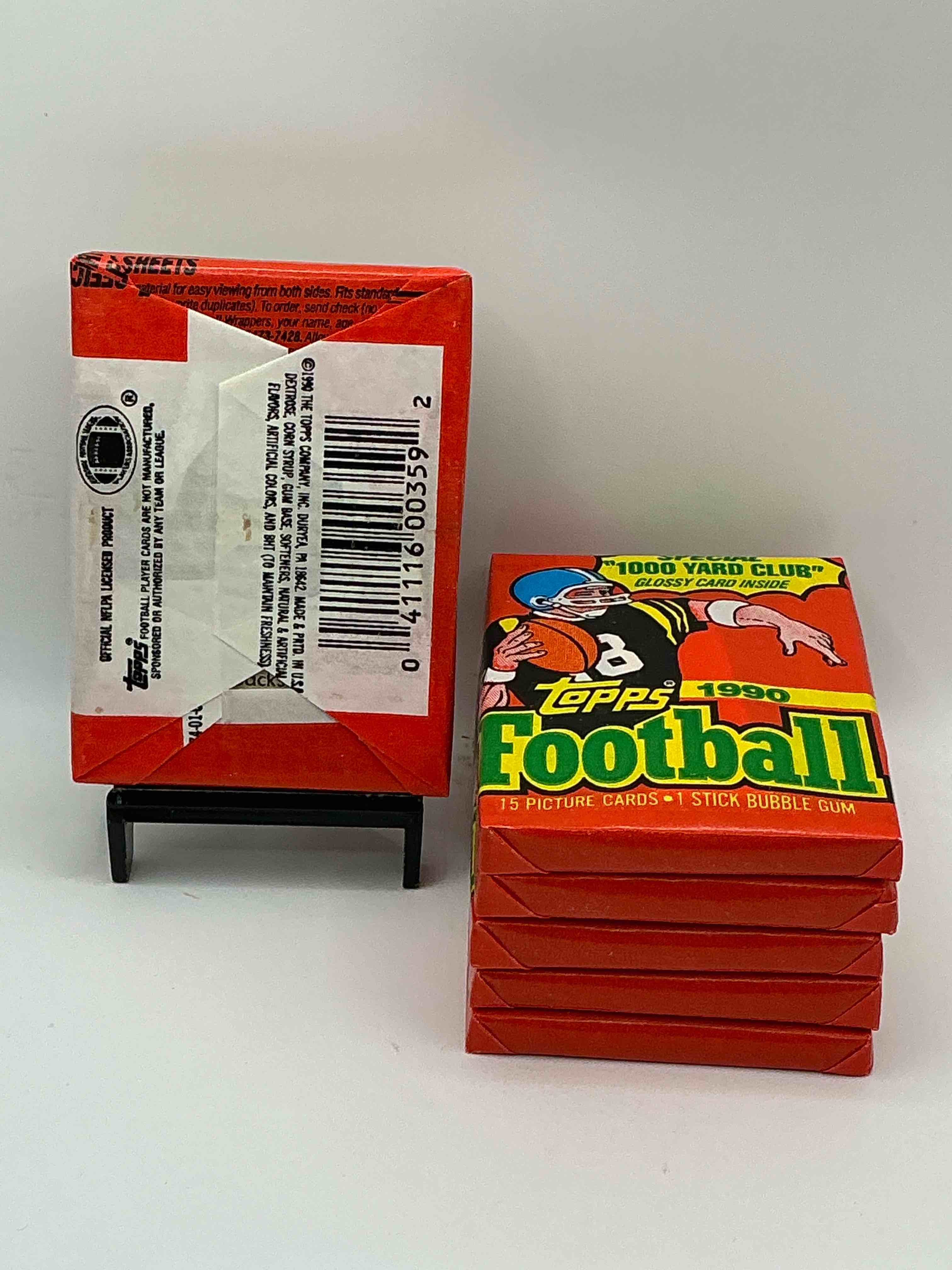 Condition photo showing New/Like New for The Last Year Of Football Wax! Joe Montana, Emmitt Smith & Barry Sanders!? 1990 Topps Football Unopened Sports Card Wax Pack, Direct From Original Retail Box! Getting Hard To Find! Search For Early Barry Sanders & Jerry Rice & So Much More!