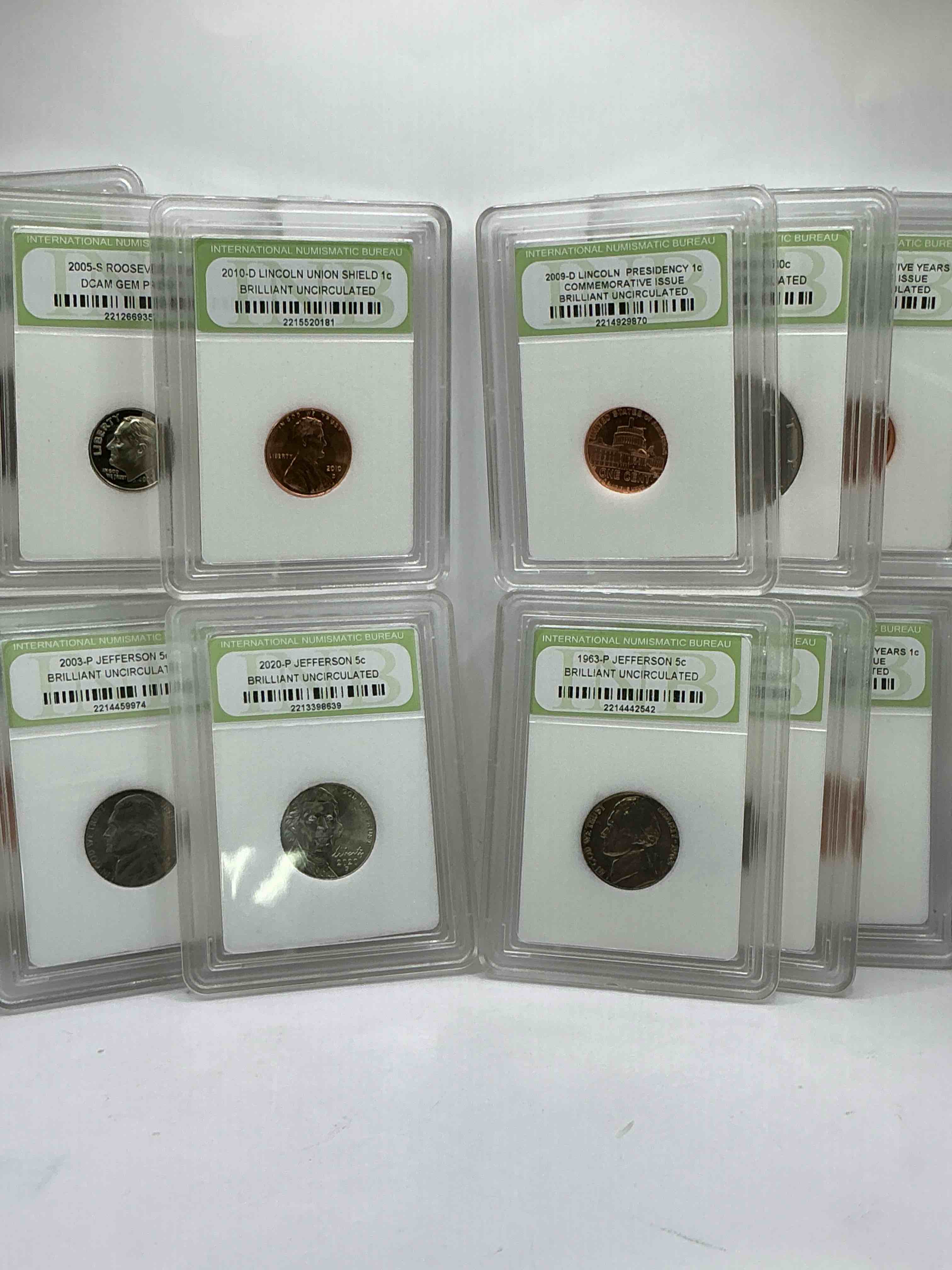 Condition photo showing New/Like New for Collector's Dream! 12 Different Rare, Slabbed U.S. Collector Coins In Certified/Catalogued Protective Slab Cases! A Great Way to Build An Incredible Collection Of Protected, Rare U.S. Coins! Great For The Coin Fan & Collector!