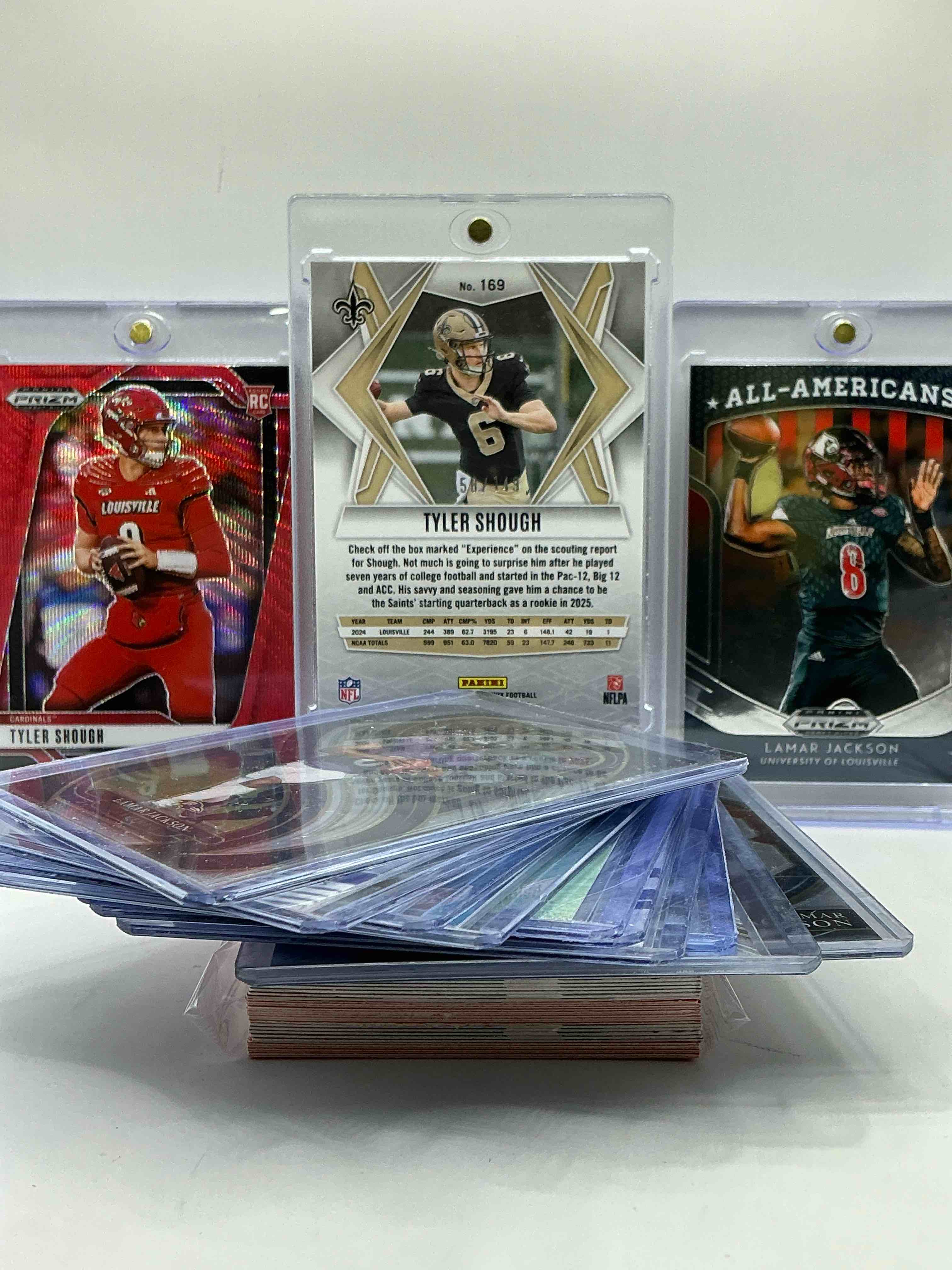 Condition photo showing New/Like New for Tyler Shough /149 Phoenix Green Rookie Card, Tyler Shough Red Prizm Louisville Cardinals Rookie, Prizm All Americans Lamar Jackson & More! 50 Card Louisville Legends Lot! WOW! Insane Trio, This Lot Includes Commons, Legends, Heroes & More! UofL!