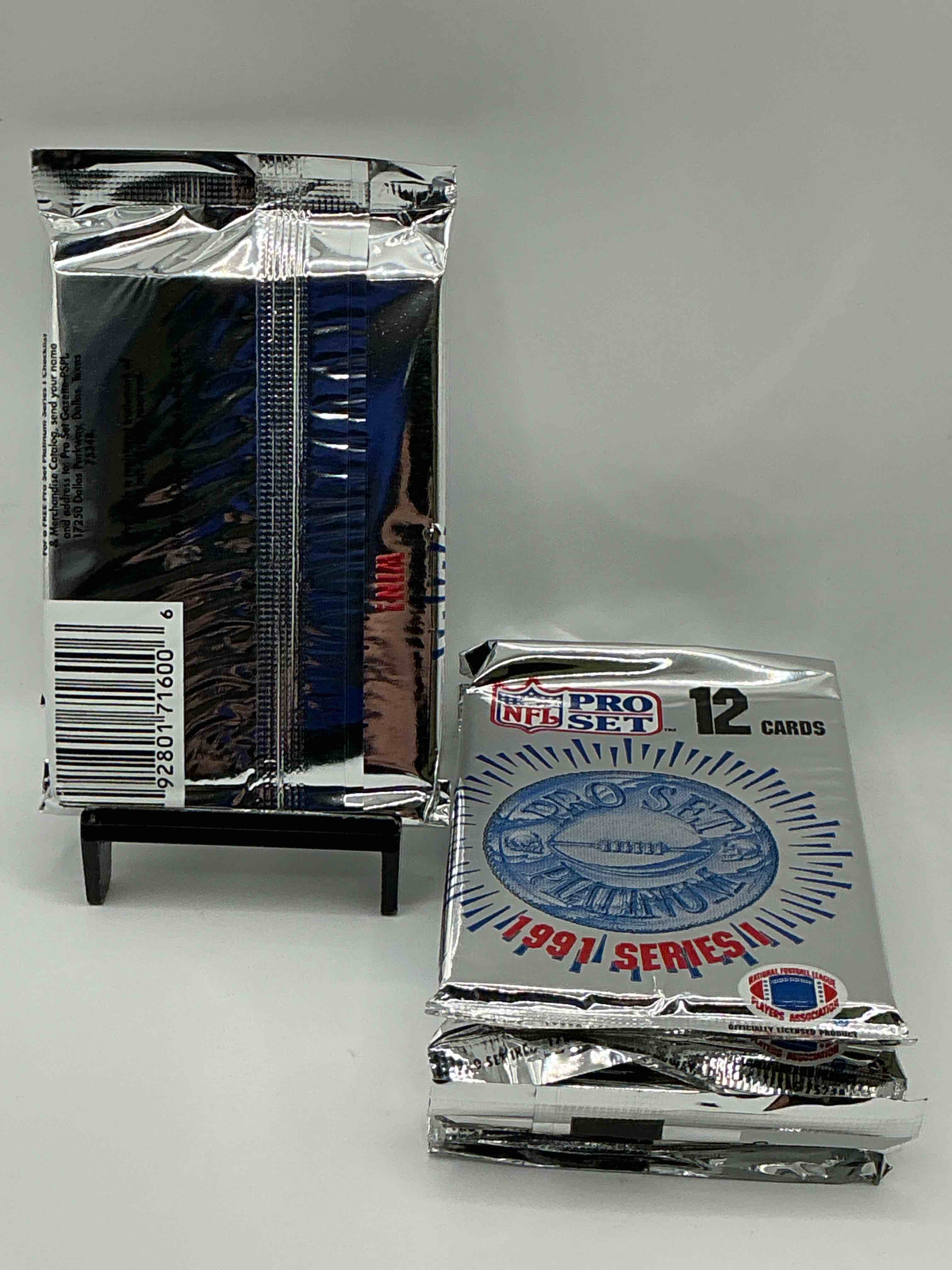 Condition photo showing New/Like New for 1991 Pro Set Platinum Edition Series I Unopened Packs! Search For Brett Favre Rookie & Bill Belichick Coach Rookie Card As Well As Santa Claus Card!