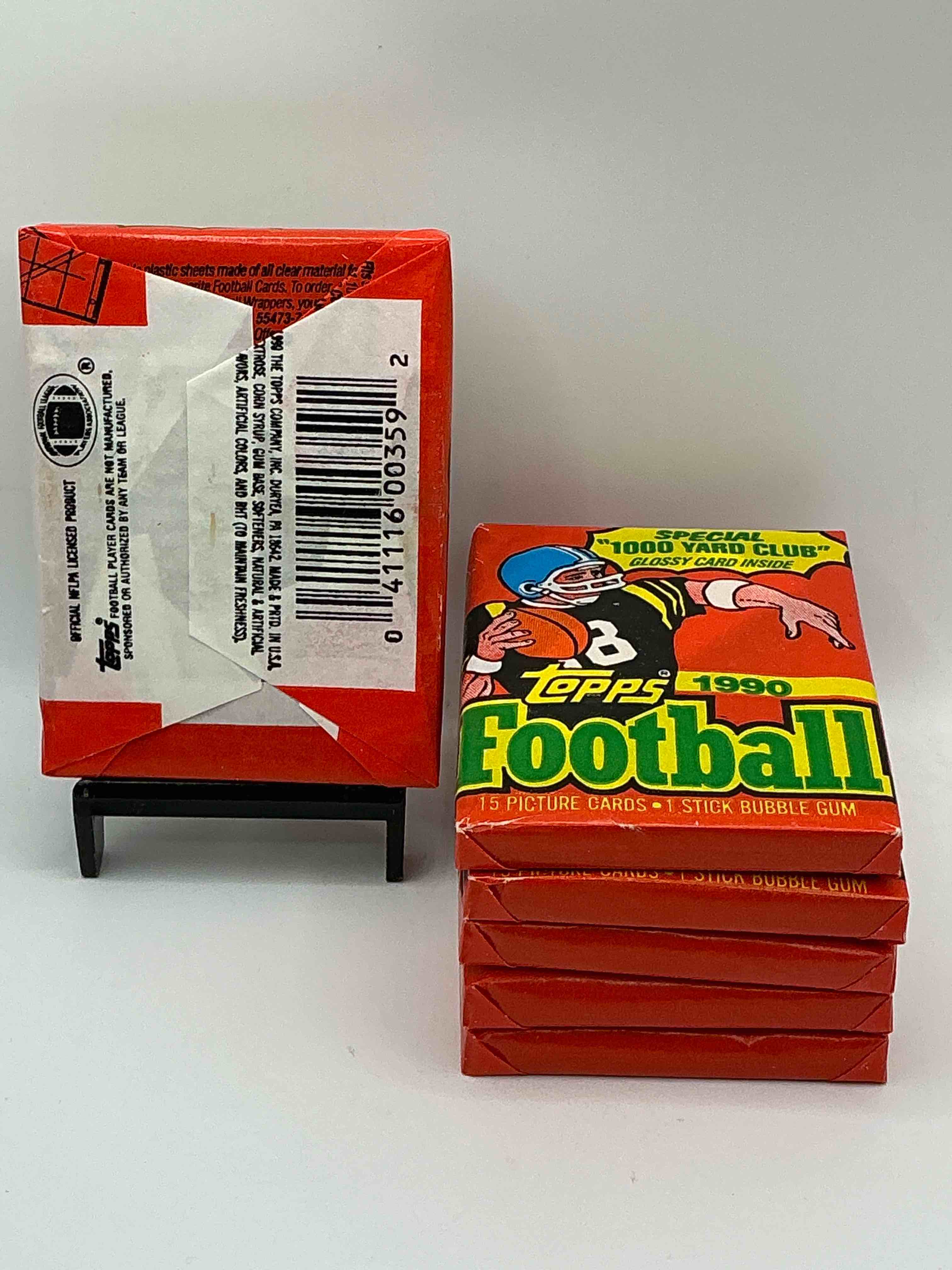 Condition photo showing New/Like New for The Last Year Of Football Wax! Joe Montana, Emmitt Smith & Barry Sanders!? 1990 Topps Football Unopened Sports Card Wax Pack, Direct From Original Retail Box! Getting Hard To Find! Search For Early Barry Sanders & Jerry Rice & So Much More!