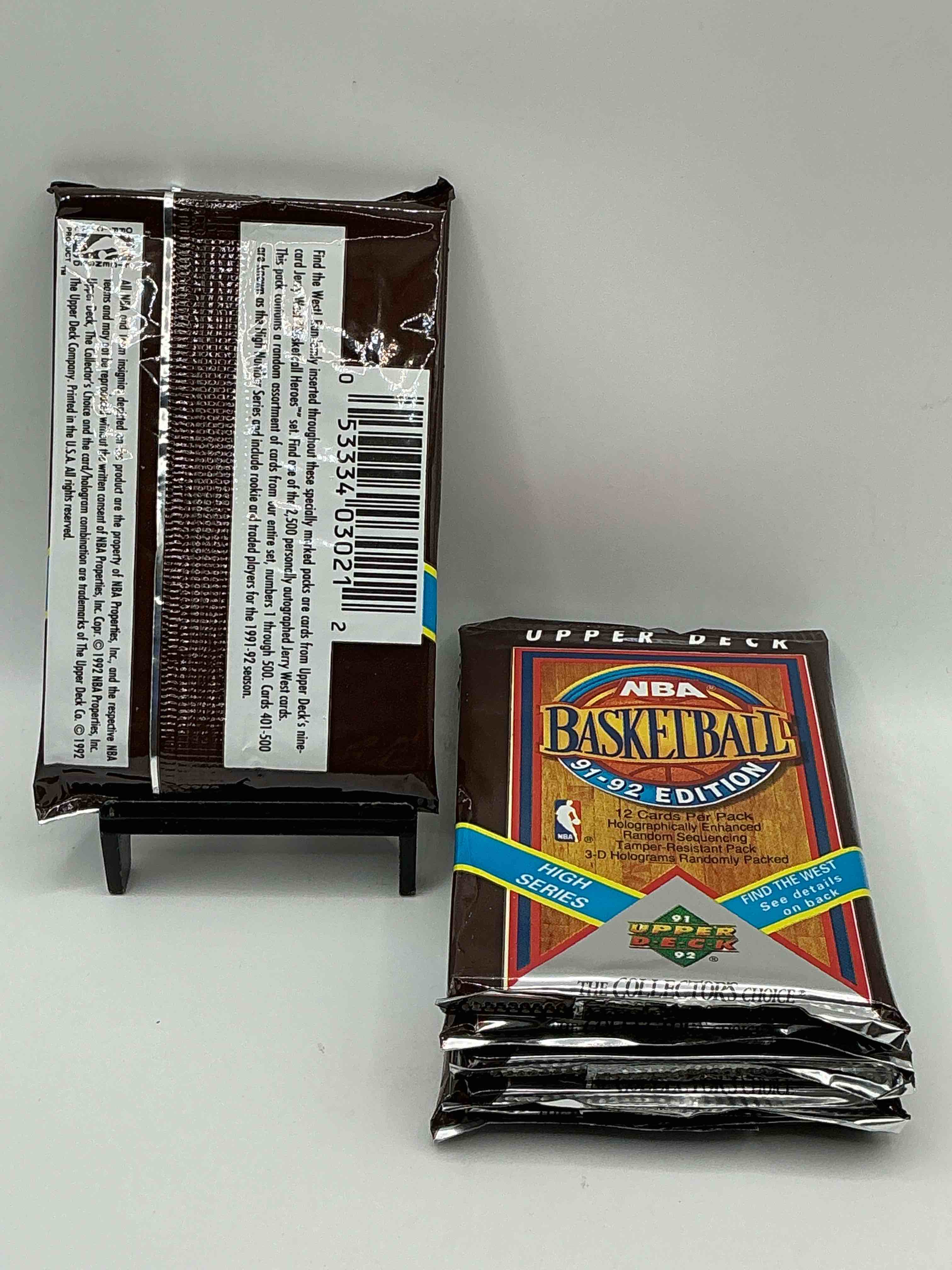 Condition photo showing New/Like New for Wow, Find The West! 1991/92 HIGH SERIES Upper Deck NBA Basketball Sealed Pack, Direct From Original Sealed Retail Case! Potential To Find A Jerry West Signature Card Only In This High Series... Super Rare! Also Search For Valuable Michael Jordans & Too Many Great Cards To List! An Awesome Investment In Sports Card Memorabilia! You May Never See These Again, Super Rare!