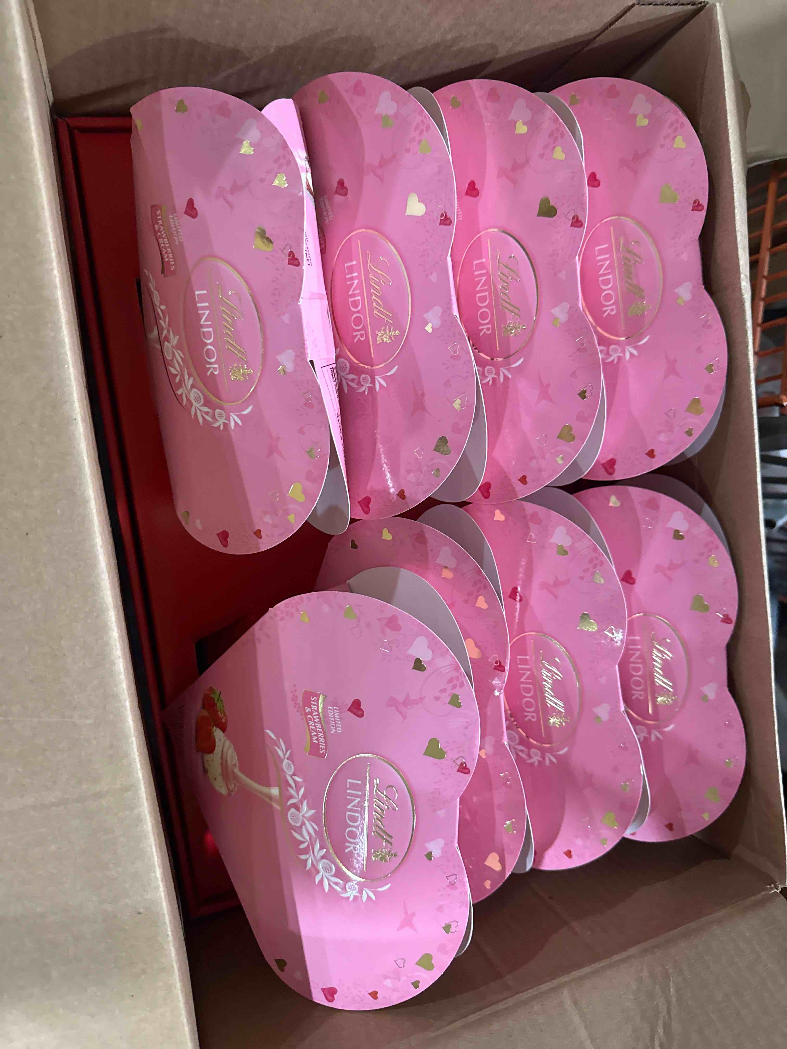 Condition photo showing Brand New for case of eight best by06 2026 lindt lindor valentine's strawberries & cream white chocolate truffles heart - 3oz
