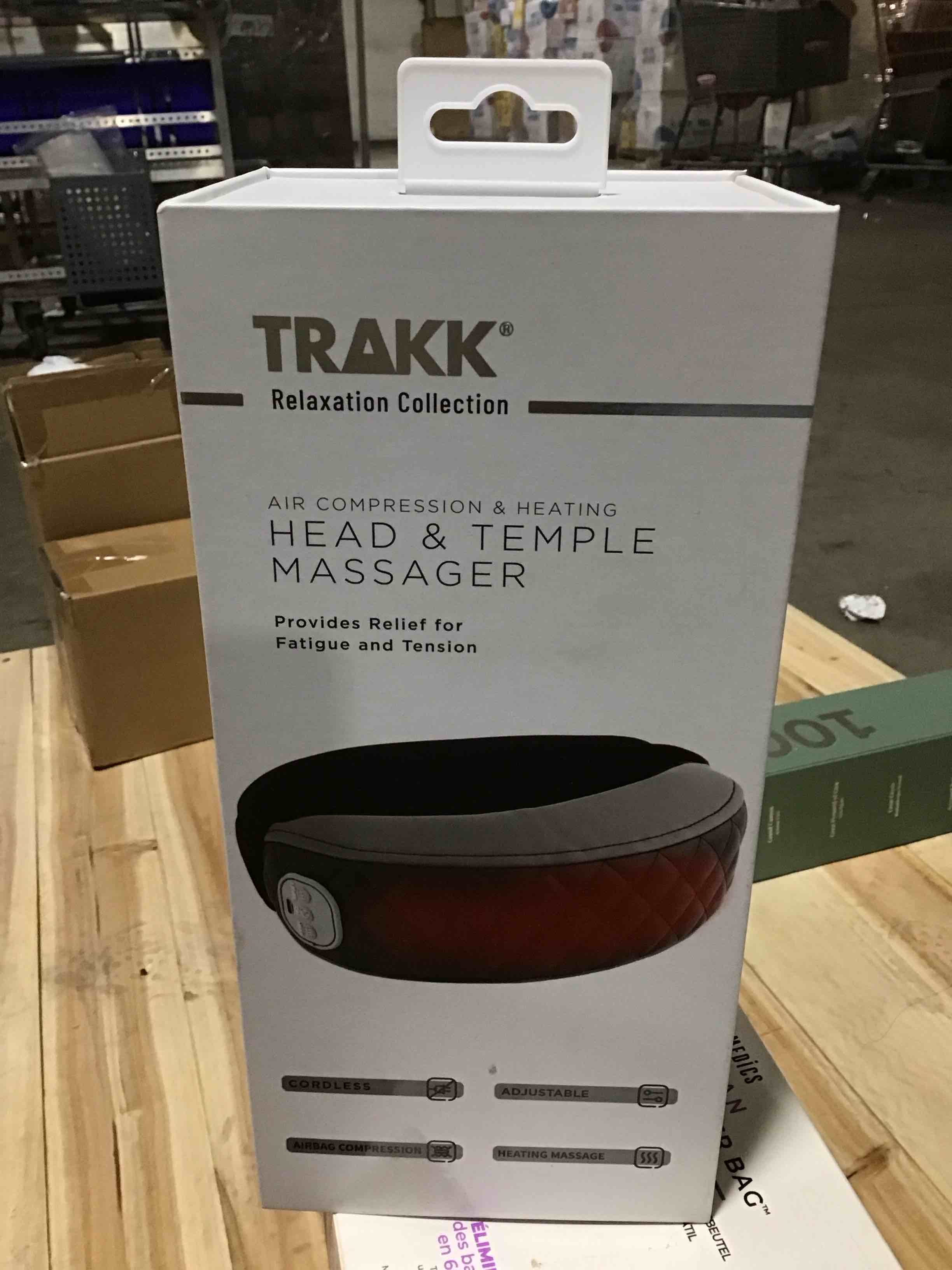 Condition photo showing New/Like New for head and temple massager