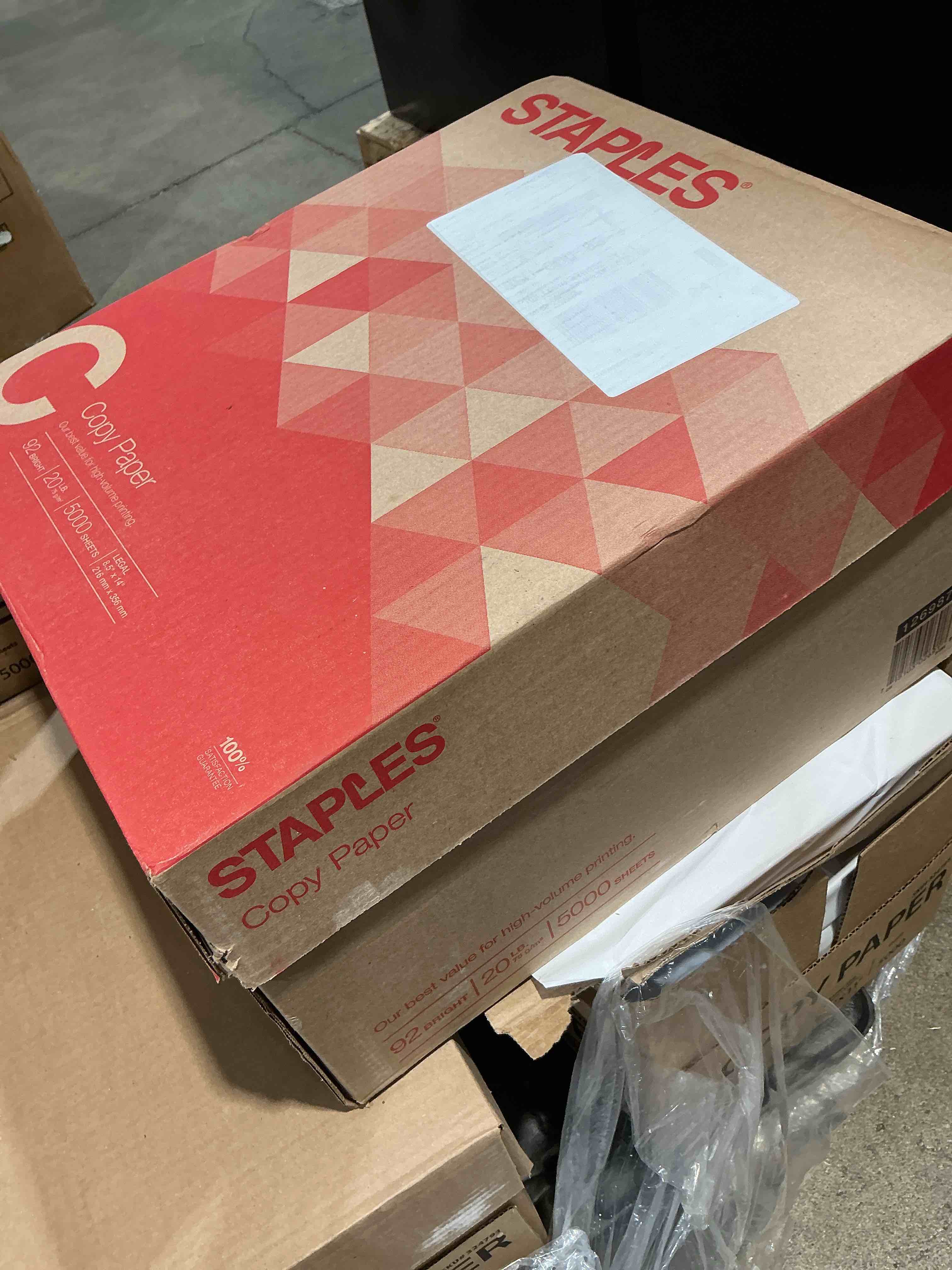Condition photo showing New/Like New for staples 8.5  x 14  copy paper 20 lbs. 92 brightness 500/ream 10 reams/ct 221193