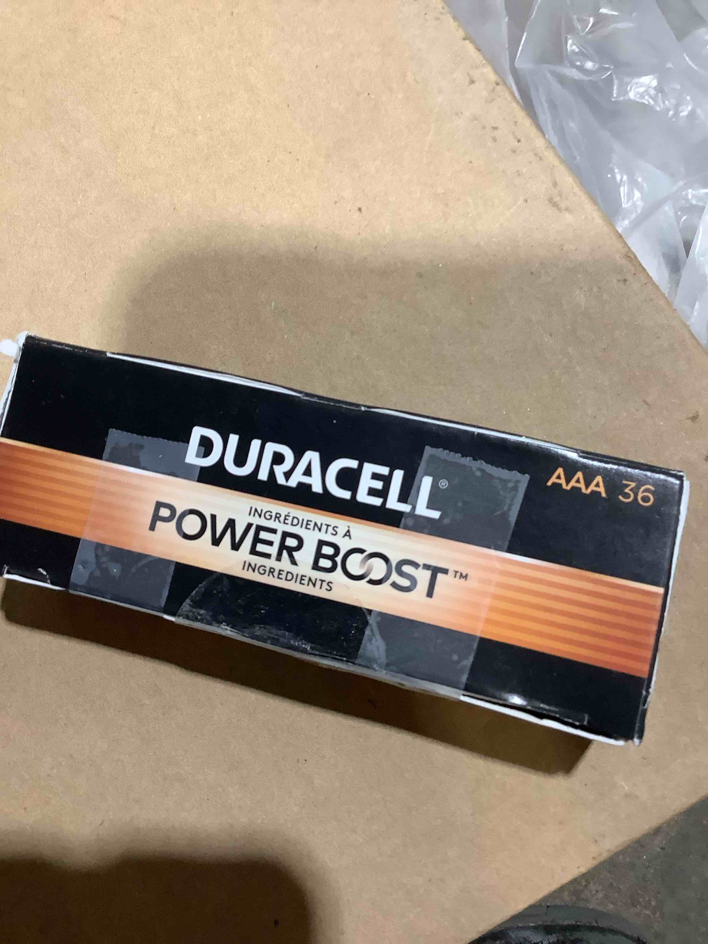 Condition photo showing New/Like New for duracell® power boost coppertop alkaline aaa batteries 36/pack mn24p36, in office.