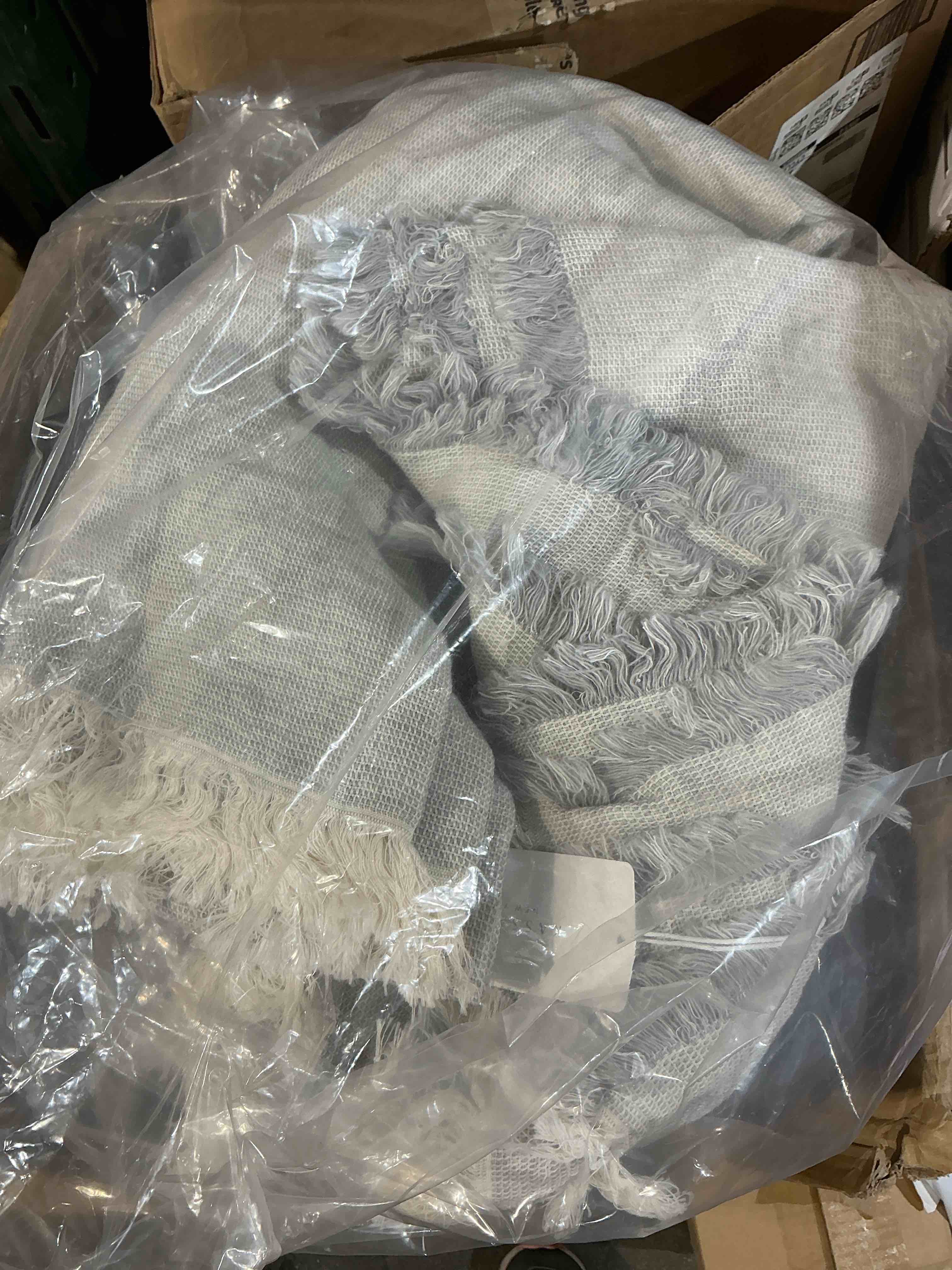 Condition photo showing New/Like New for hedwig ruffled throw 