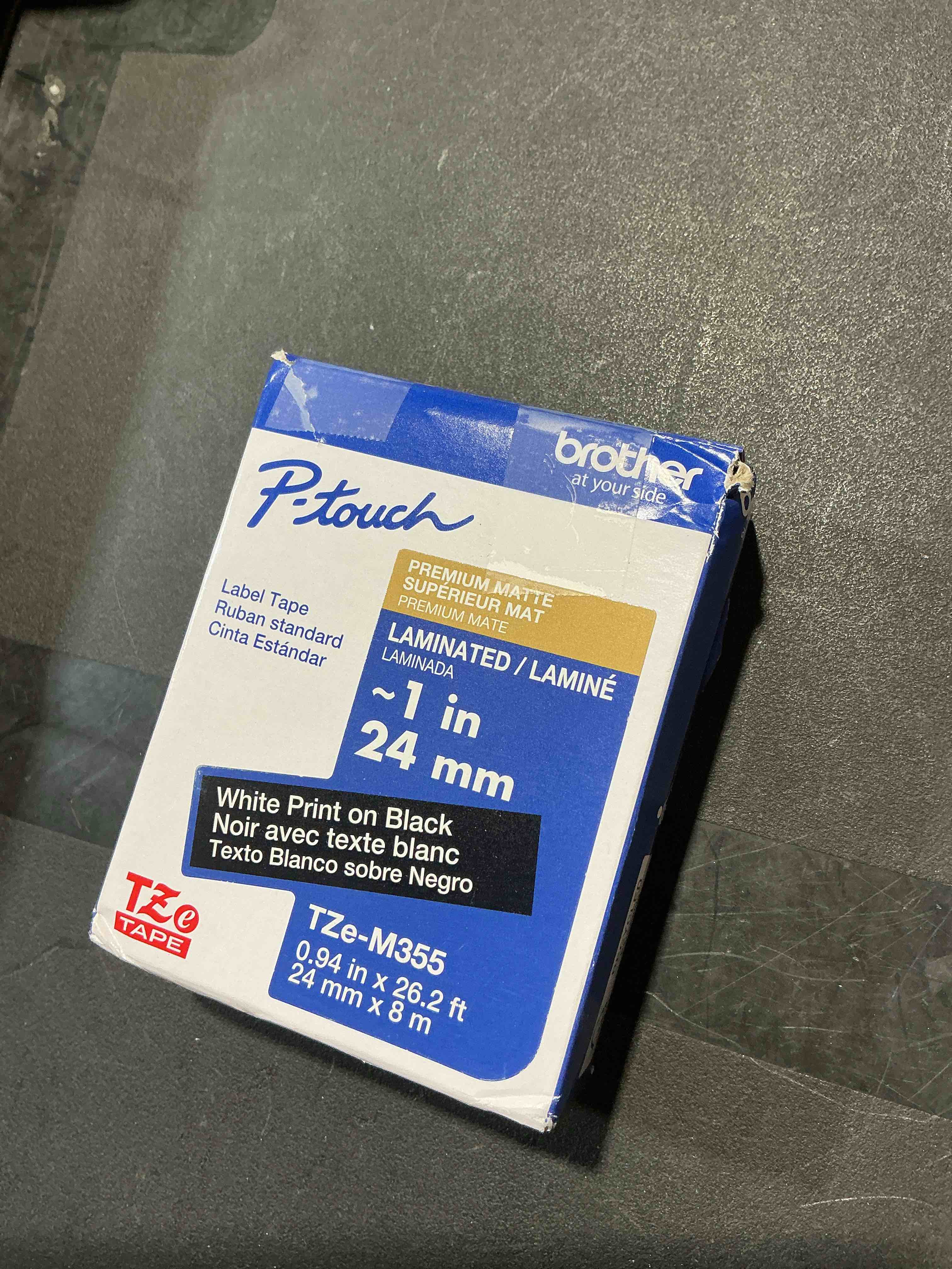 Condition photo showing New/Like New for brother p-touch tzem355 white print on black label tape 3/4 in x 26.2 ft laminated 1-piece