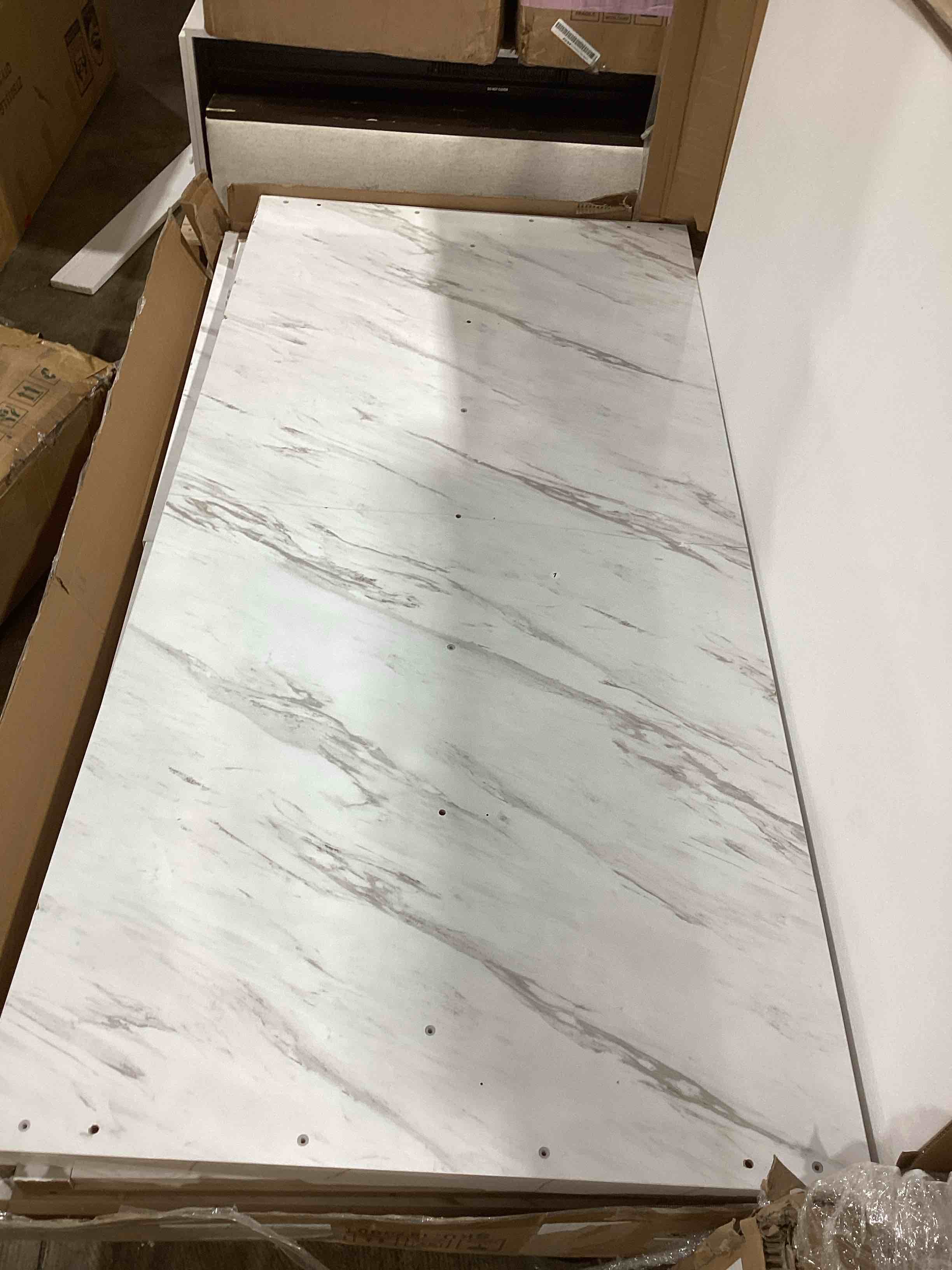 Condition photo showing As Is for hkdm066 71" prada white stone bar table with fluted center panel and modern rectangular silhouette color white 