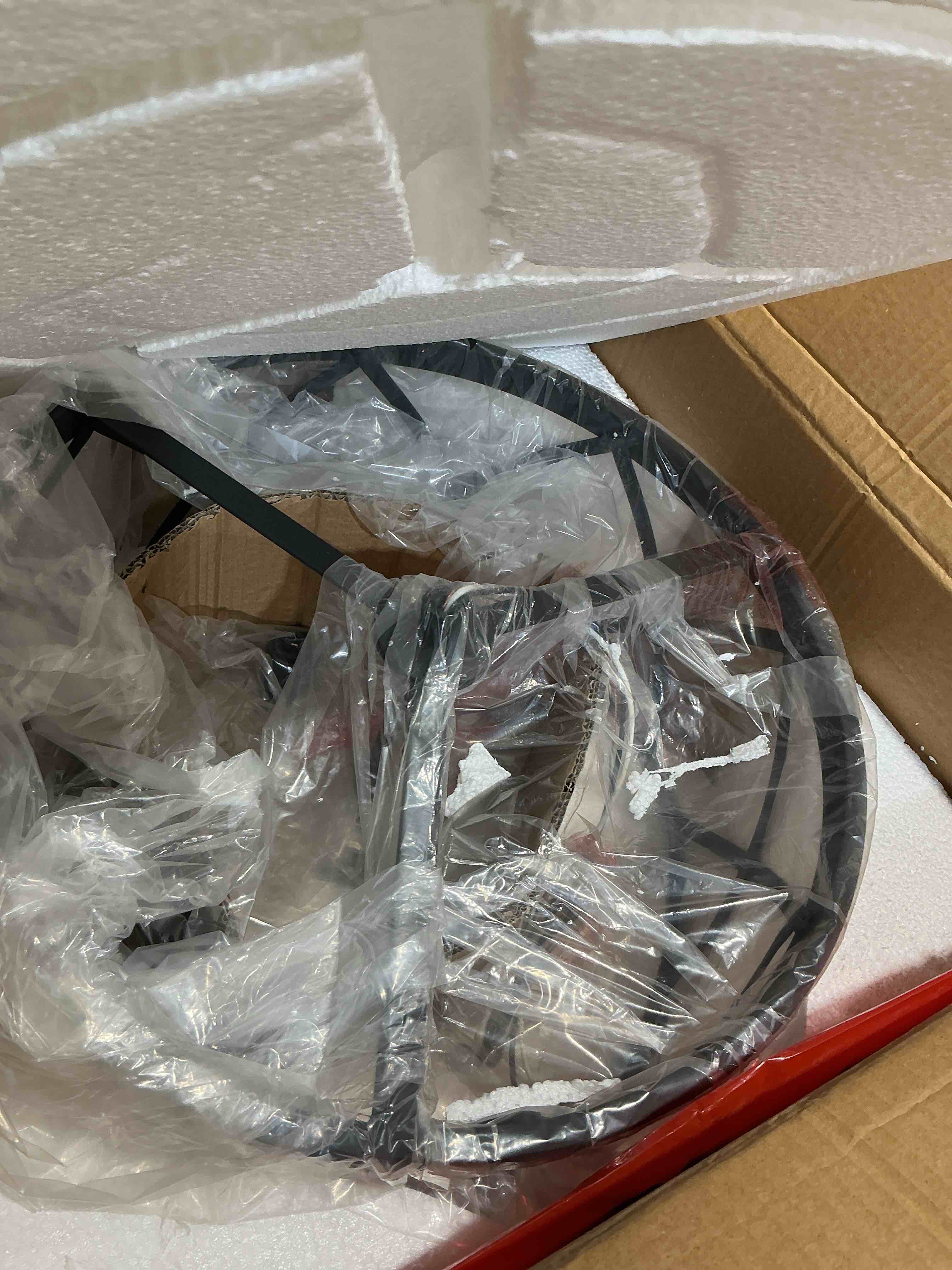 Condition photo showing New/Like New for acroma grieco 4 -light matte black bare bulb metal chandelier