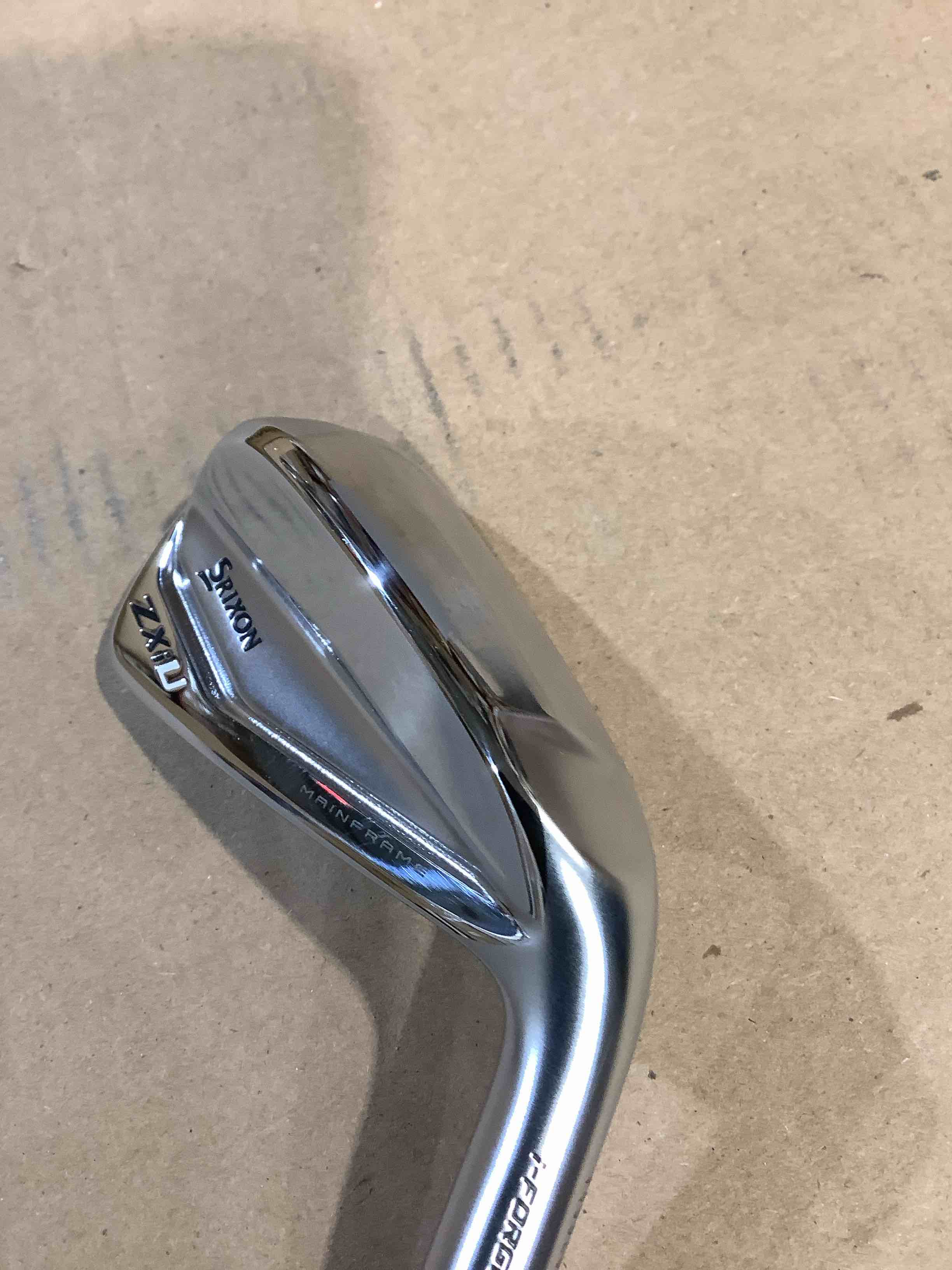 Condition photo showing New/Like New for sri on zxu right handed 2 / 18 iron golf club, in office