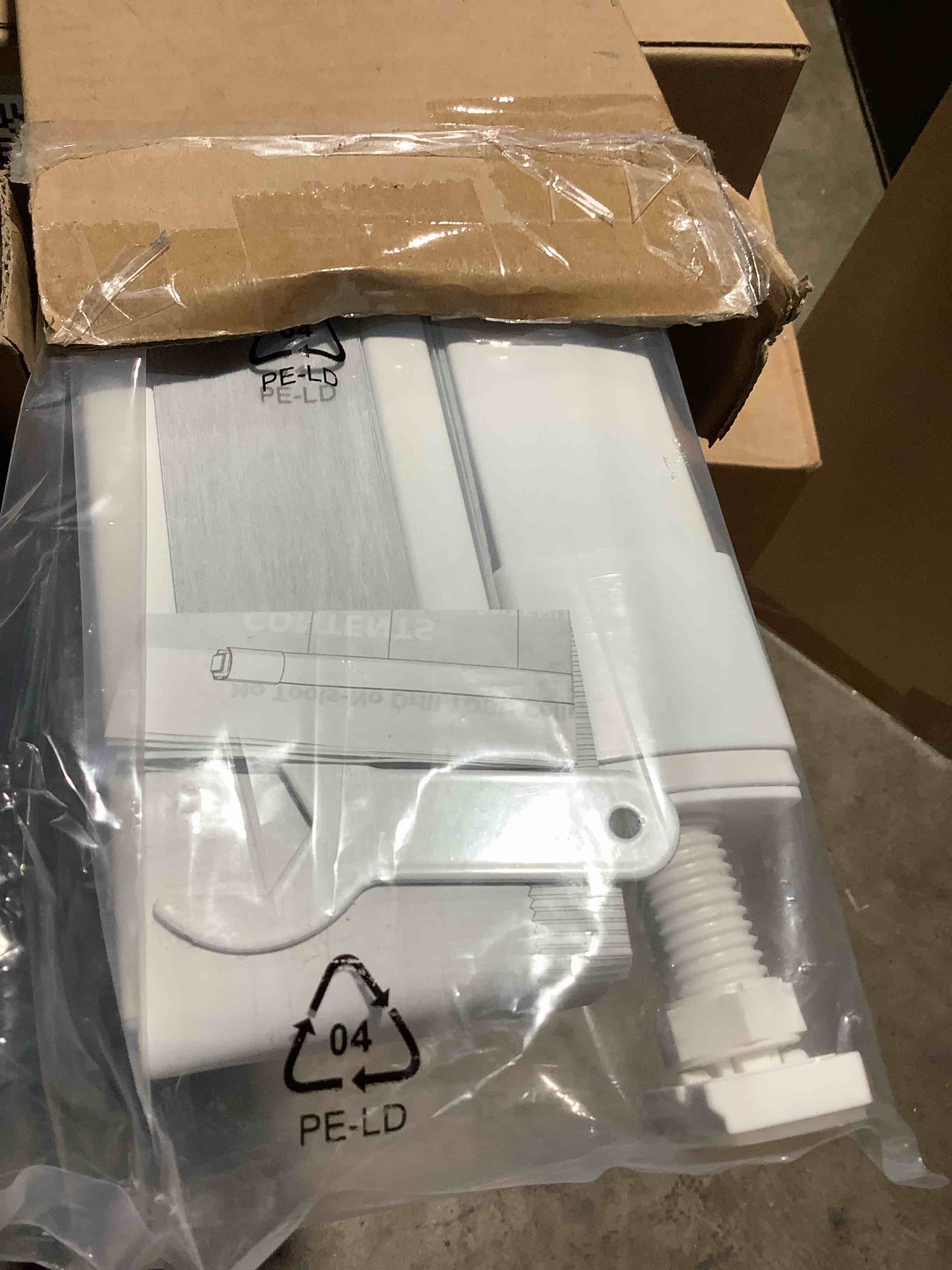 Condition photo showing New/Like New for cordless white window shade, 28" wide