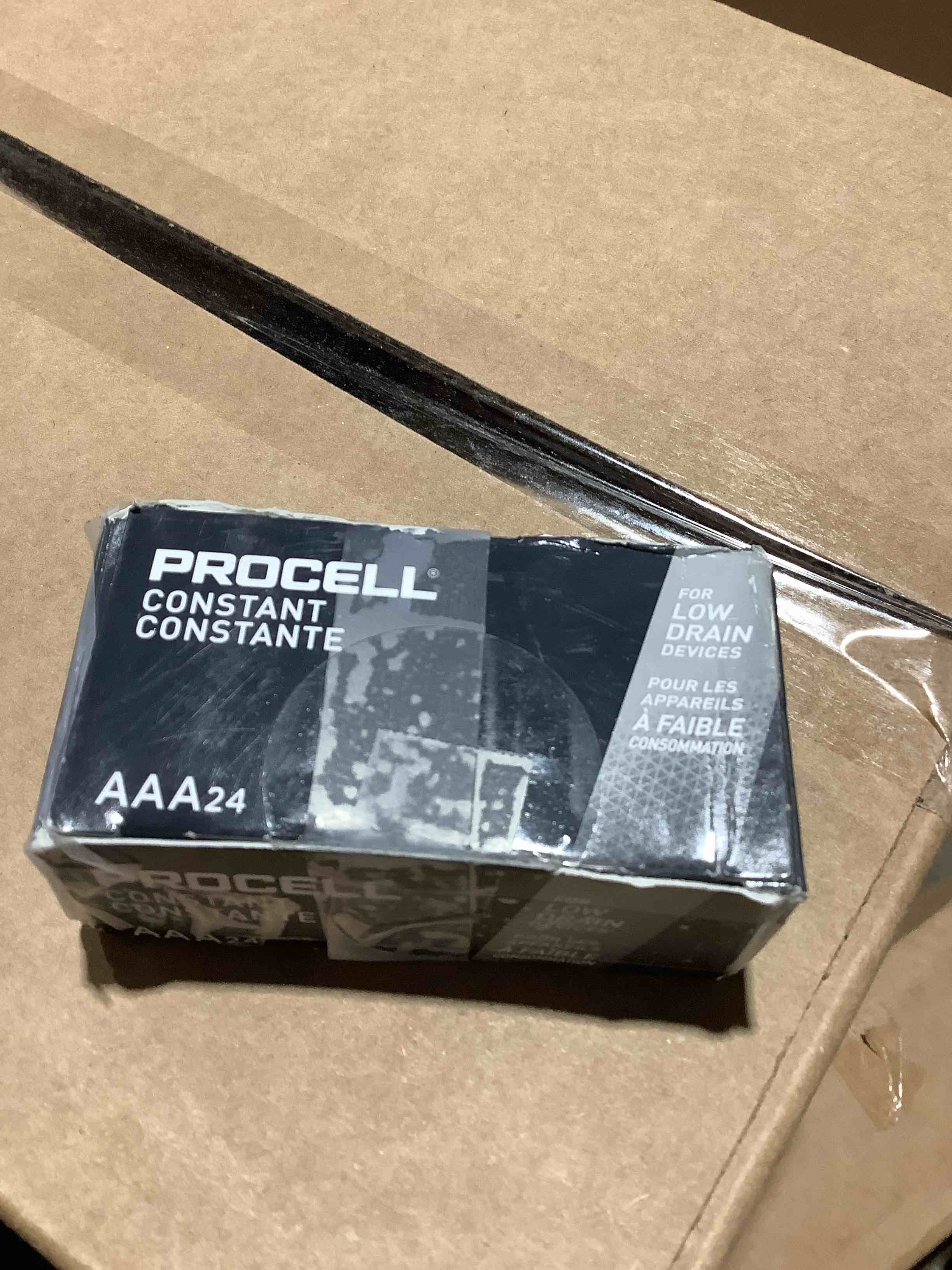 Condition photo showing New/Like New for procell aaa alkaline batteries  box of 24, in office