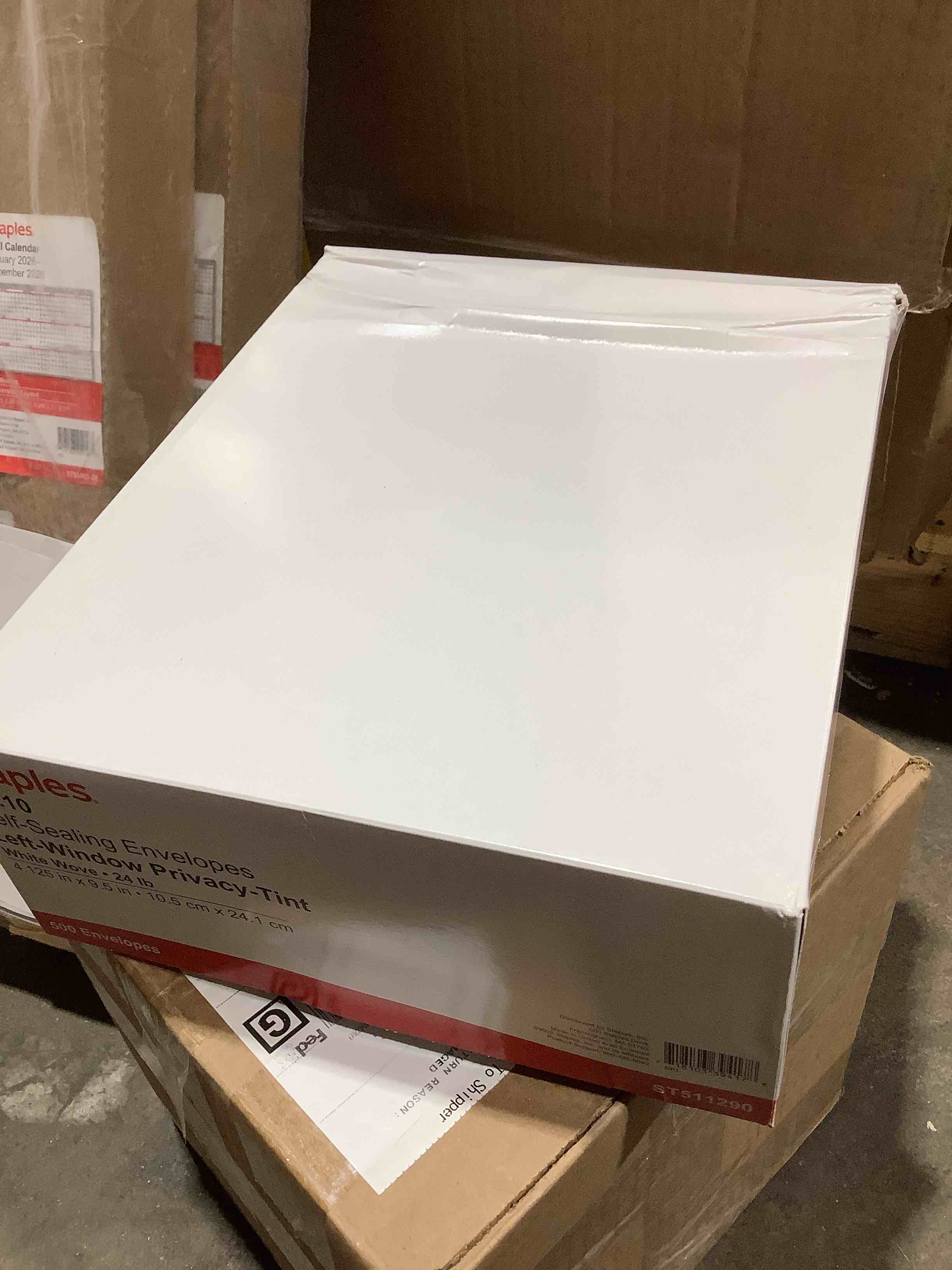 Condition photo showing New/Like New for staples no. 10 self sealing envelopes left window privacy tint,whitewove 24 lbs. 500 count