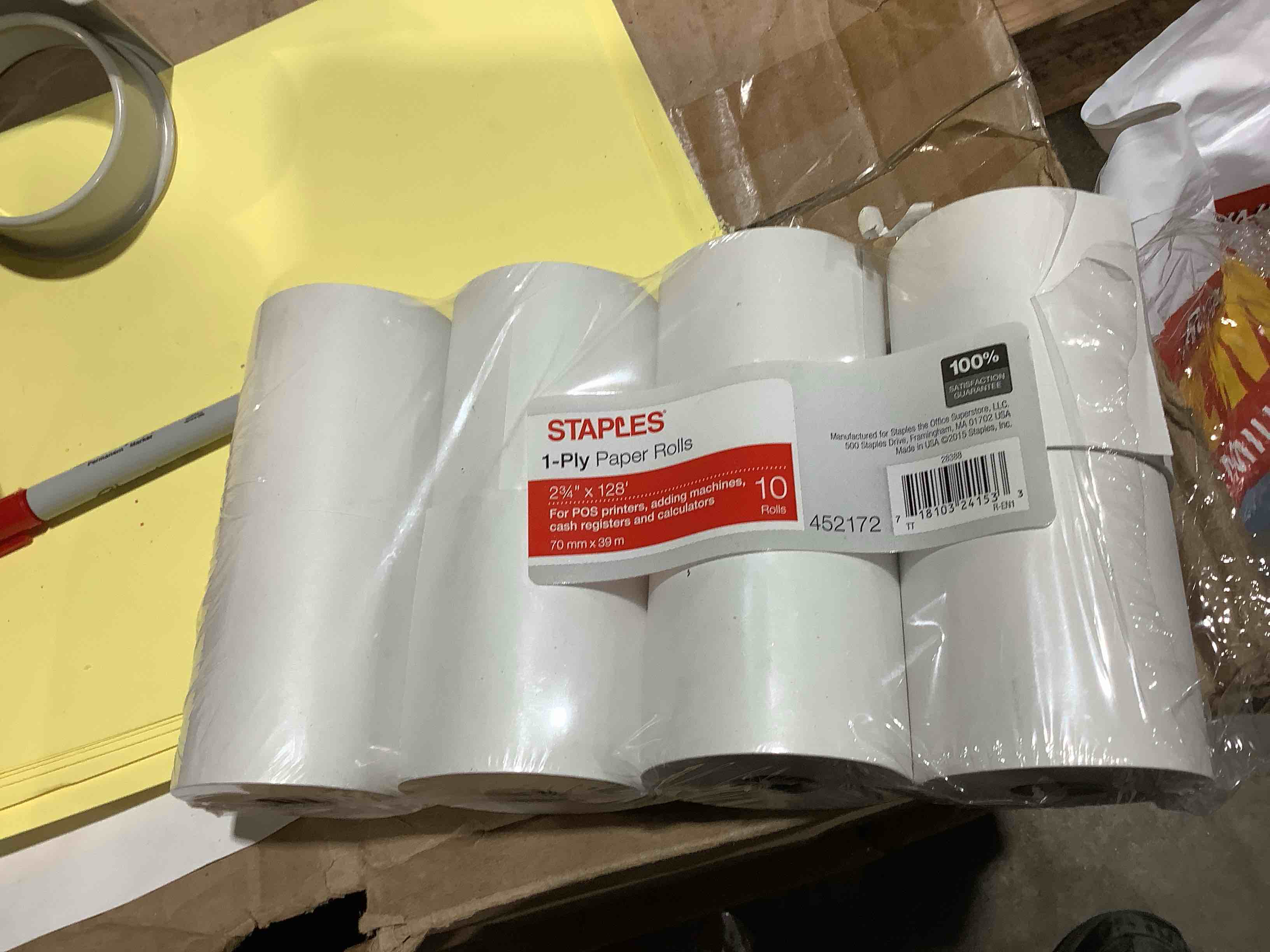 Condition photo showing New/Like New for staples 1 ply 2-3/4" x 128' paper rolls, missing 2 rolls.