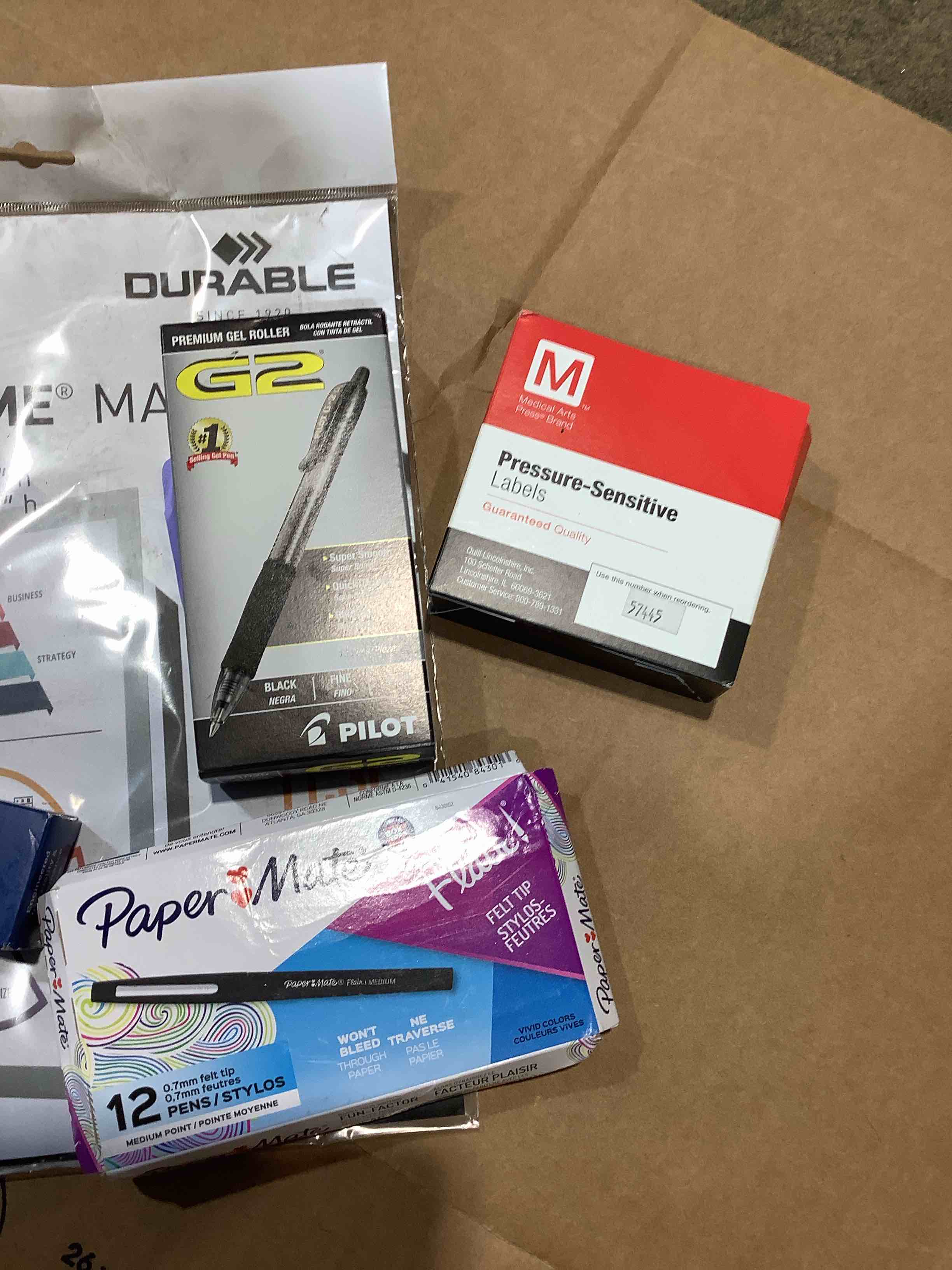 Assorted Office Supplies: Ink pen, Papermate pens, Labels, Stapes and more