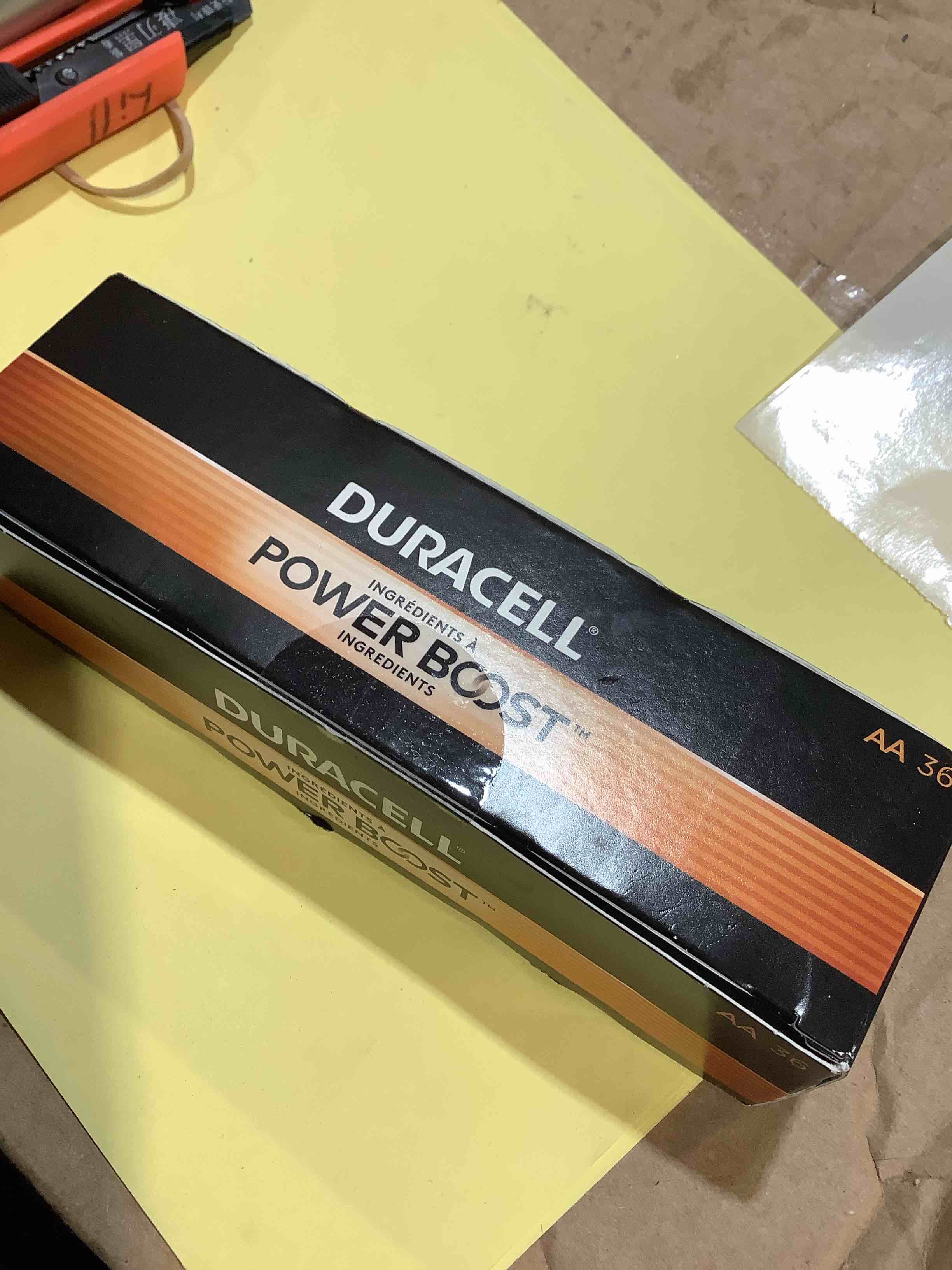 Condition photo showing New/Like New for coppertop alkaline aa batteries 36/pack, in office