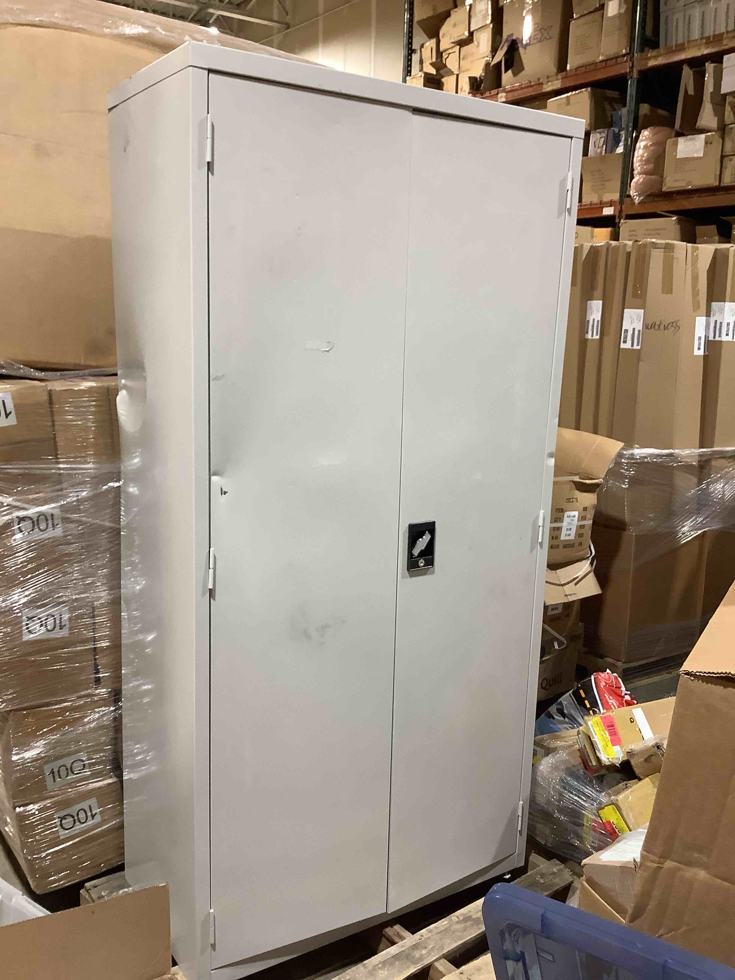 Condition photo showing Good Condition for 2 door steel elite gray storage cabinet with adjustable shelves, with key