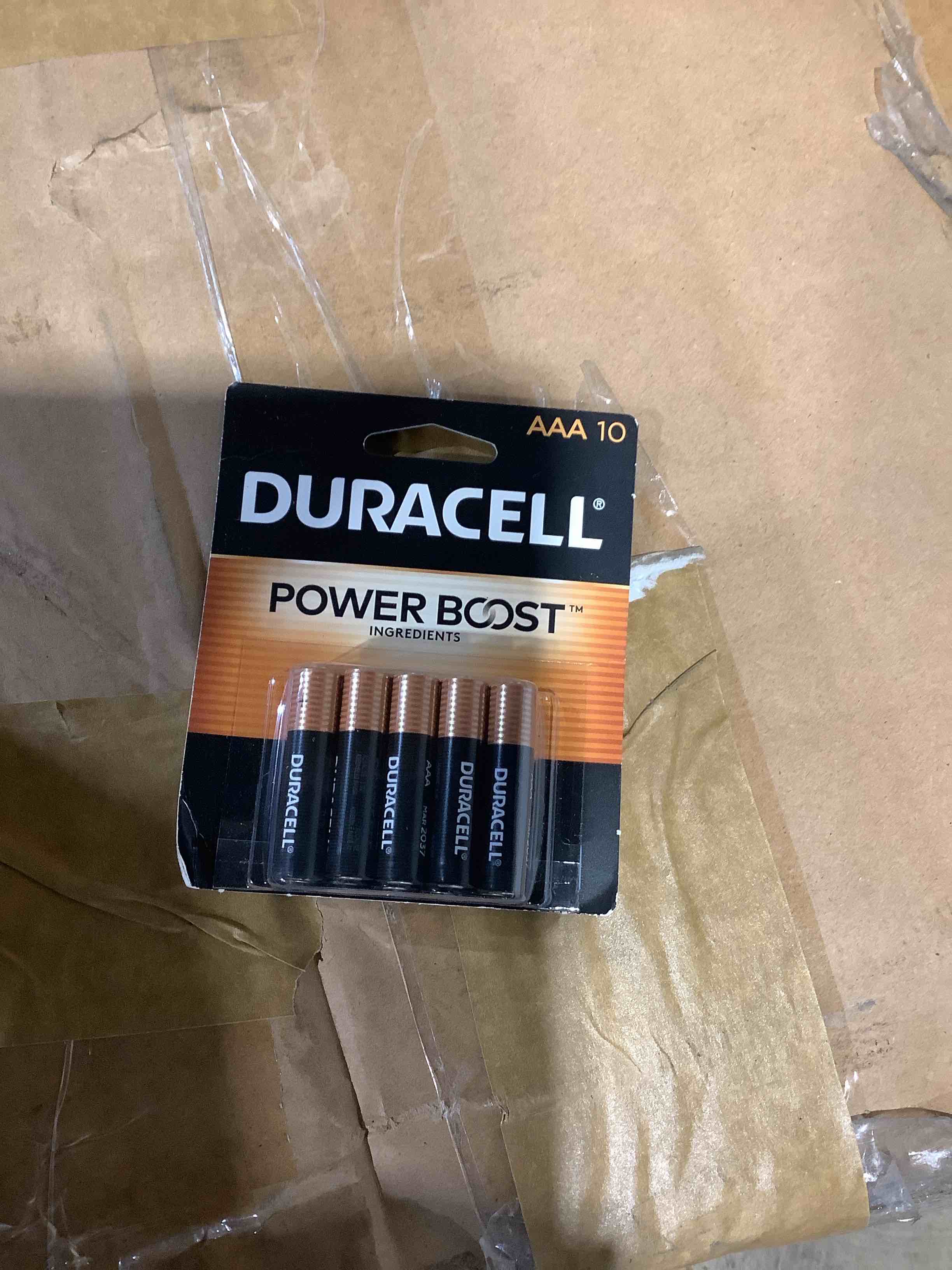 Condition photo showing New/Like New for duracell coppertop aaa batteries - 10pk alkaline battery, in office