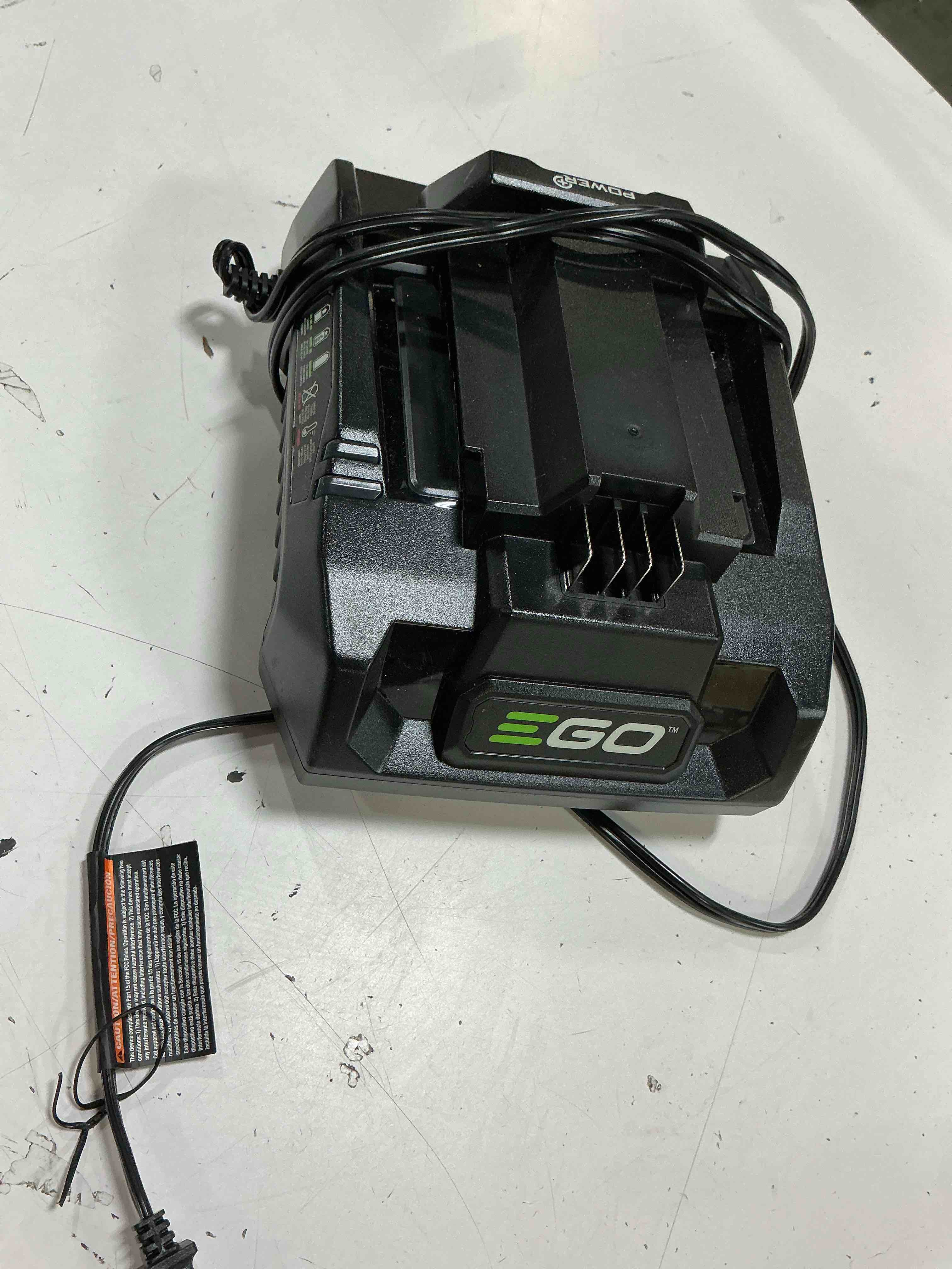 Condition photo showing As Is for original ego power+ ch3200 320w 56-volt lithium-ion charger