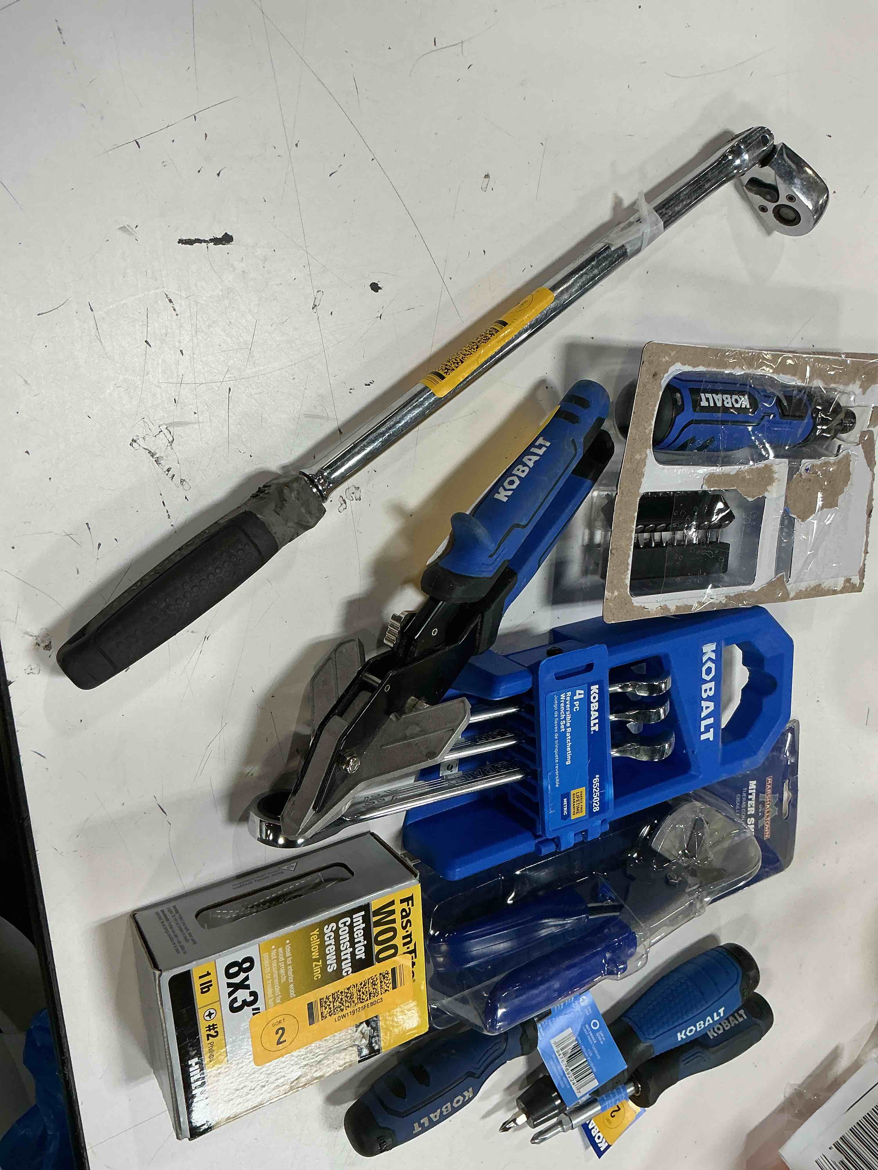 Condition photo showing As Is for assorted home improvement lot (small tools, screw, home accessories, etc.)