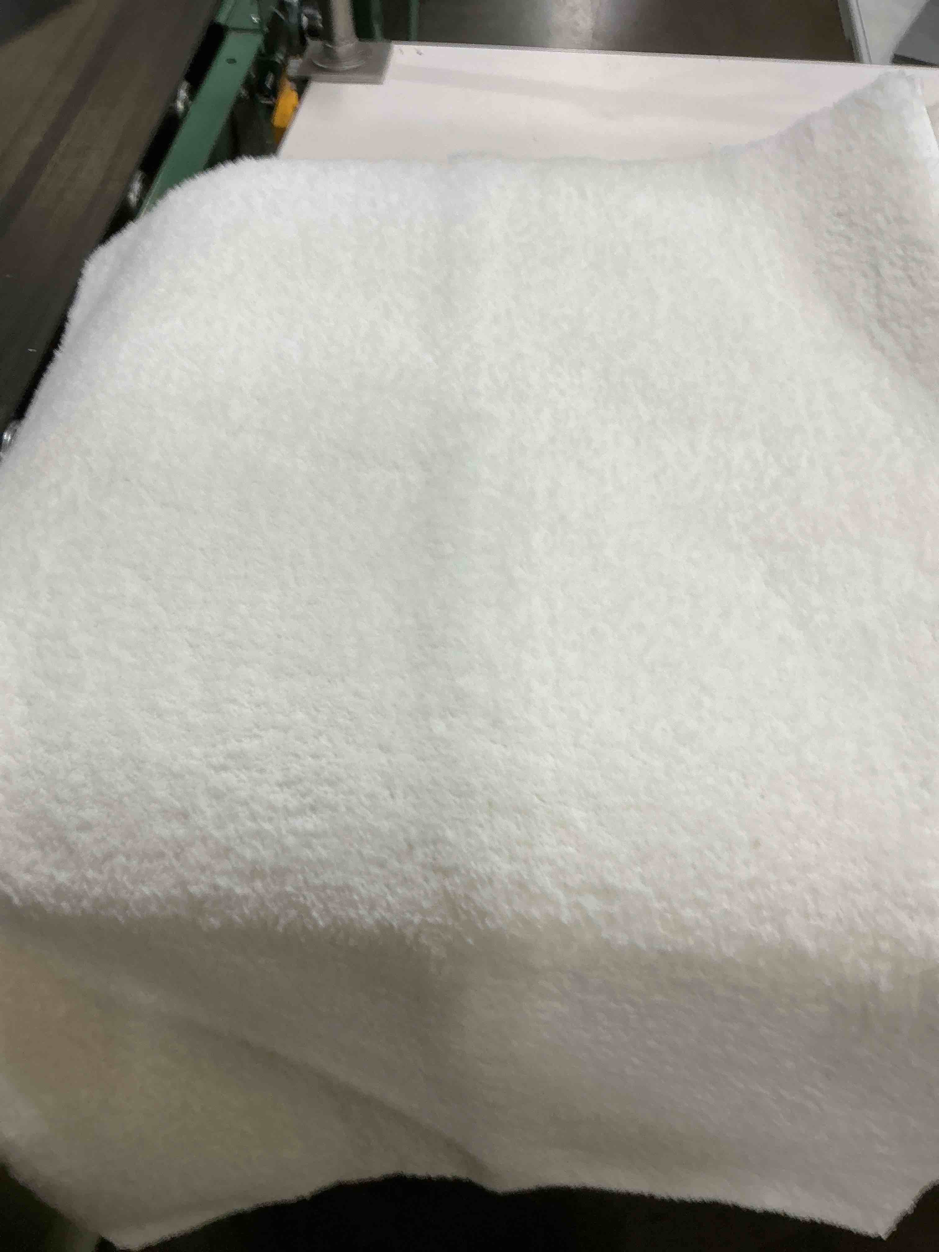 Condition photo showing Good Condition for better homes & gardens ultra soft polyester bath rug, 21x34”  arctic white