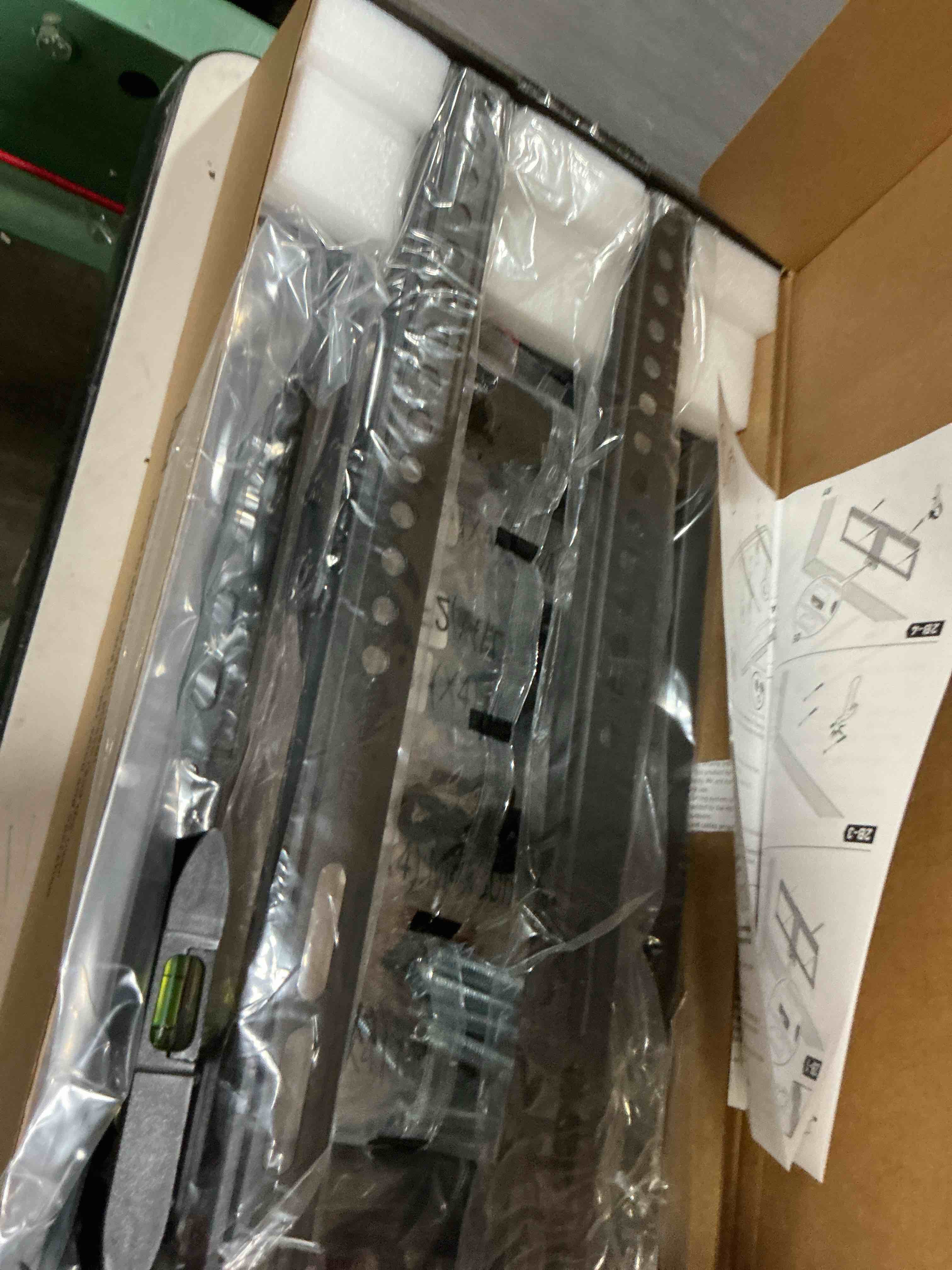 Condition photo showing Good Condition for mountftv tilting tv wall mount for 32-82 inch tvs  low profile flat wall mount bracket  max 600x400mm  holds up to 132lbs  fit 16   18   24  stud