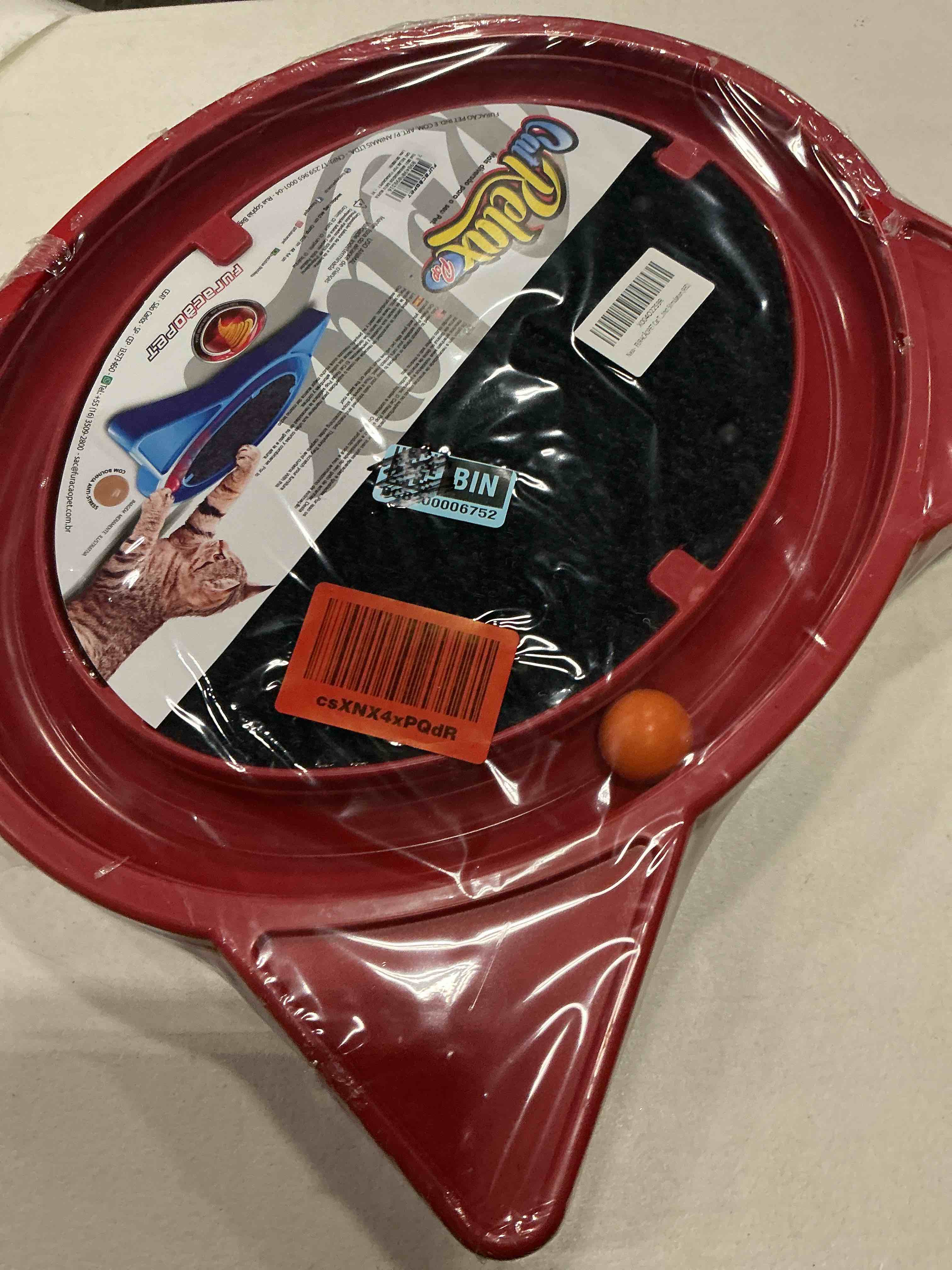 Condition photo showing New/Like New for cat toy with scratcher pad and rolling ball – oval track for independent play and instinct stimulation (red) red oval
