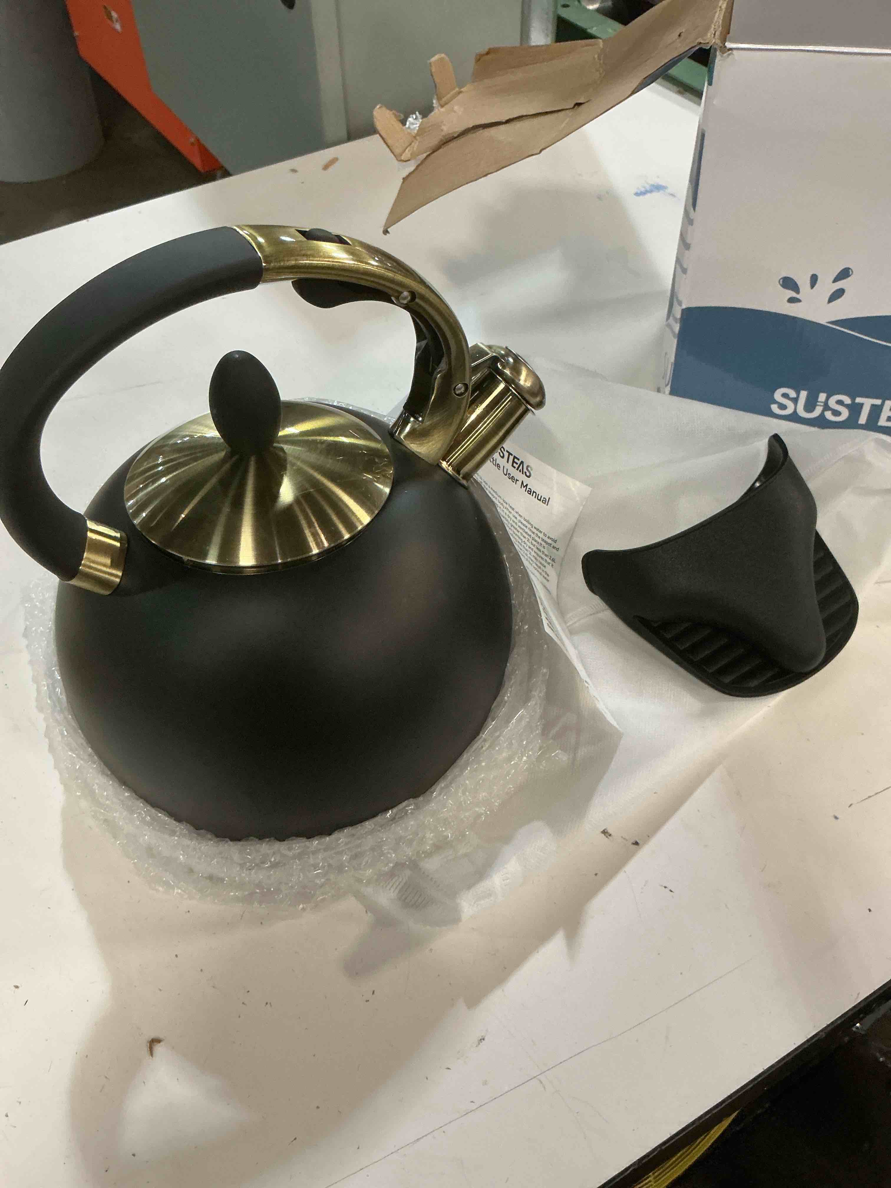 Condition photo showing As Is for susteas stove top whistling tea kettle - food grade stainless steel teakettle teapot with cool touch ergonomic handle, with 1 silicone pinch mitt included, 2.64 quart(black)