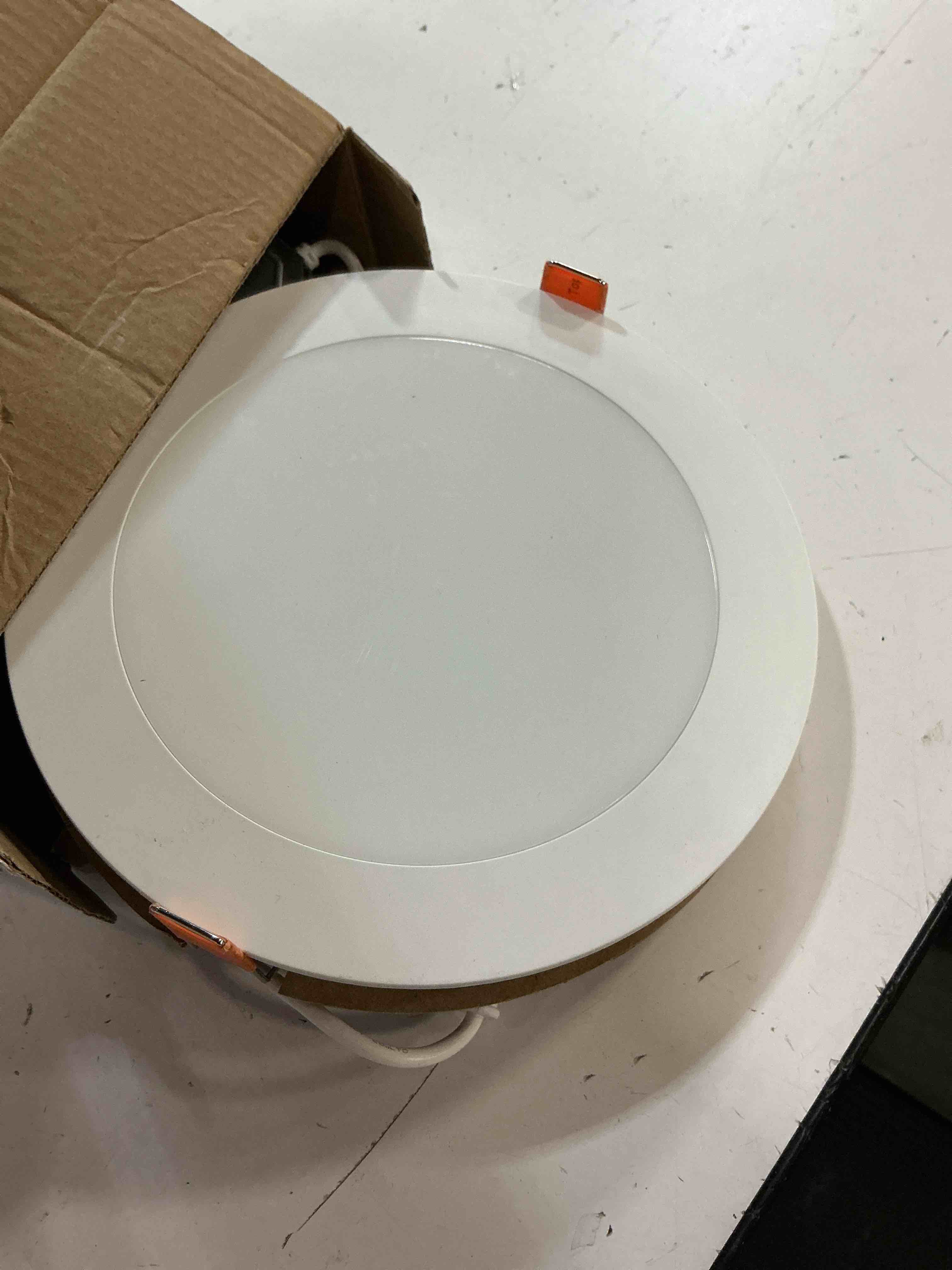 Condition photo showing As Is for hlbph 6 in. slim in/outdoor canless led downlight, 6 selectable color temperatures, dimmable, 950 lumens, matte white