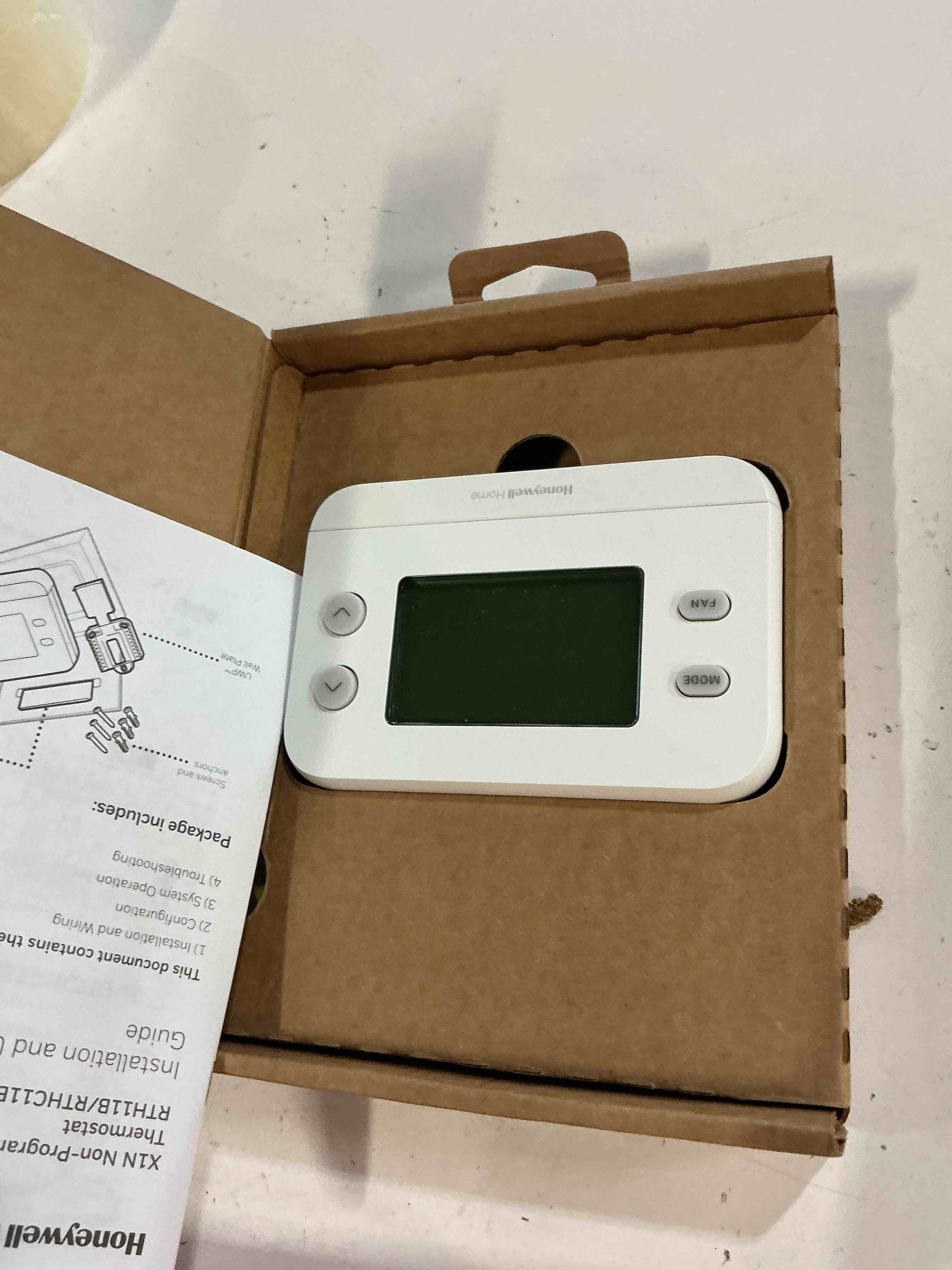 Condition photo showing As Is for honeywell home x1n 24-volt mechanical non-programmable thermostat single-stage heating