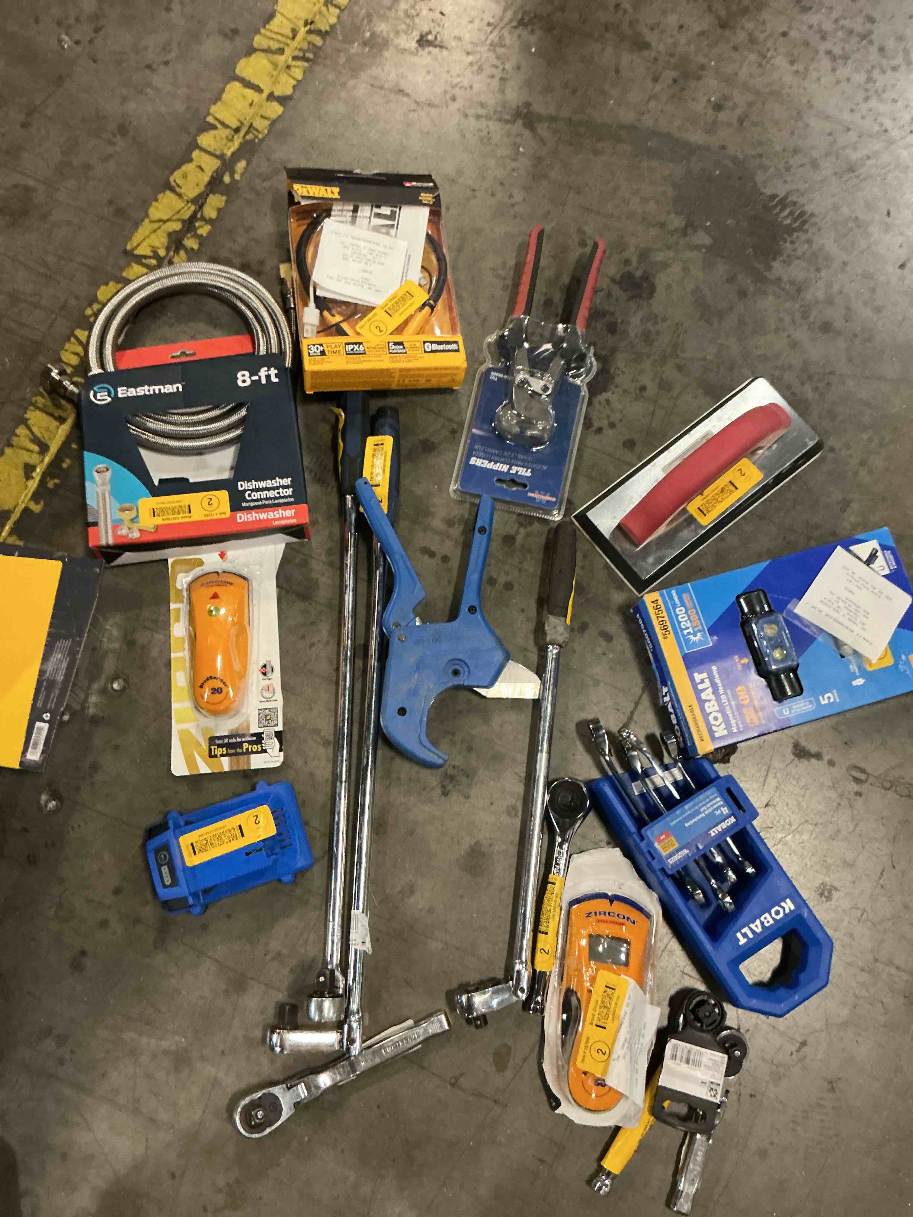 Condition photo showing As Is for assorted home improvement lot (small tools, screw, home accessories, etc.)