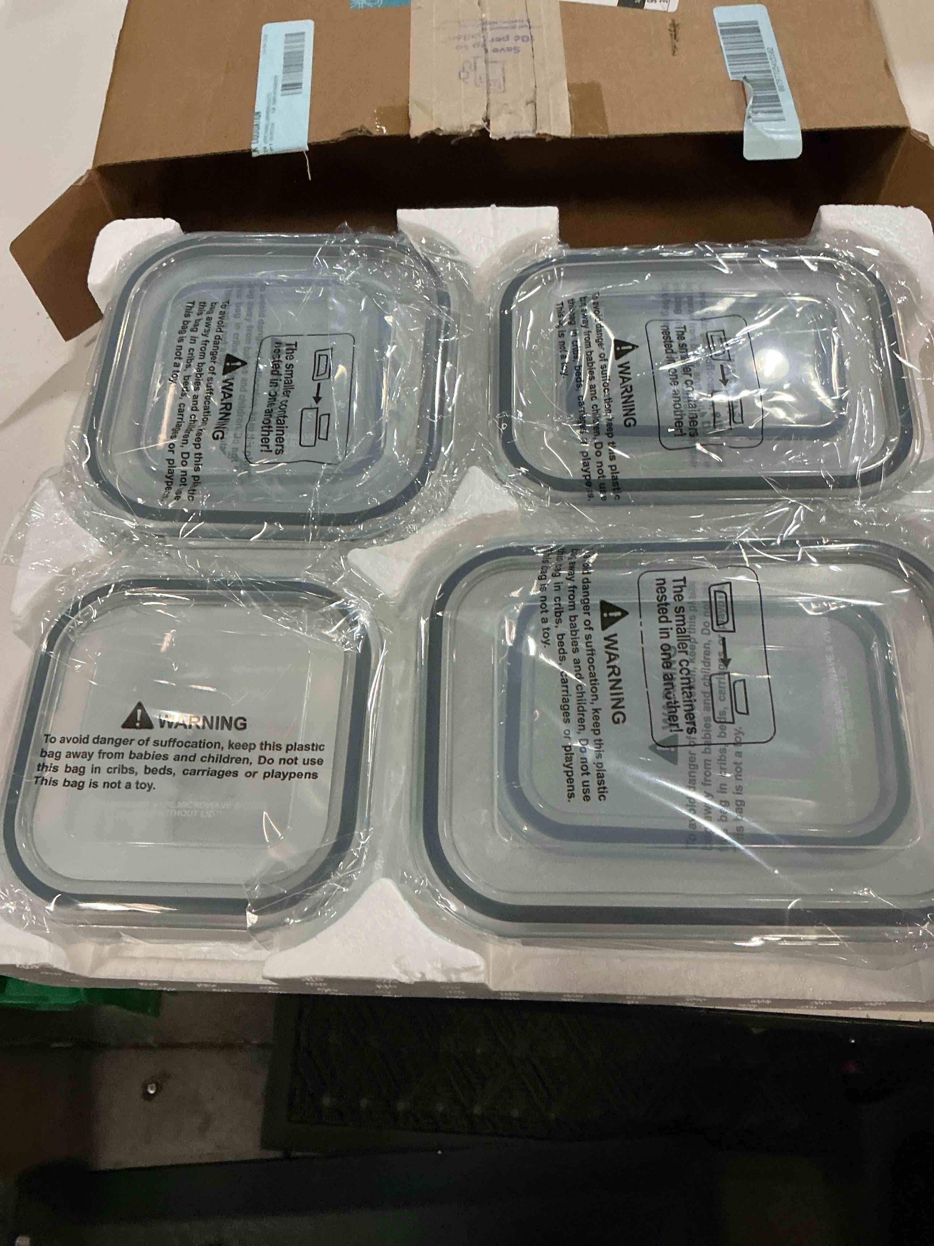 Condition photo showing New/Like New for glass food storage containers with snap-locking airtight lids