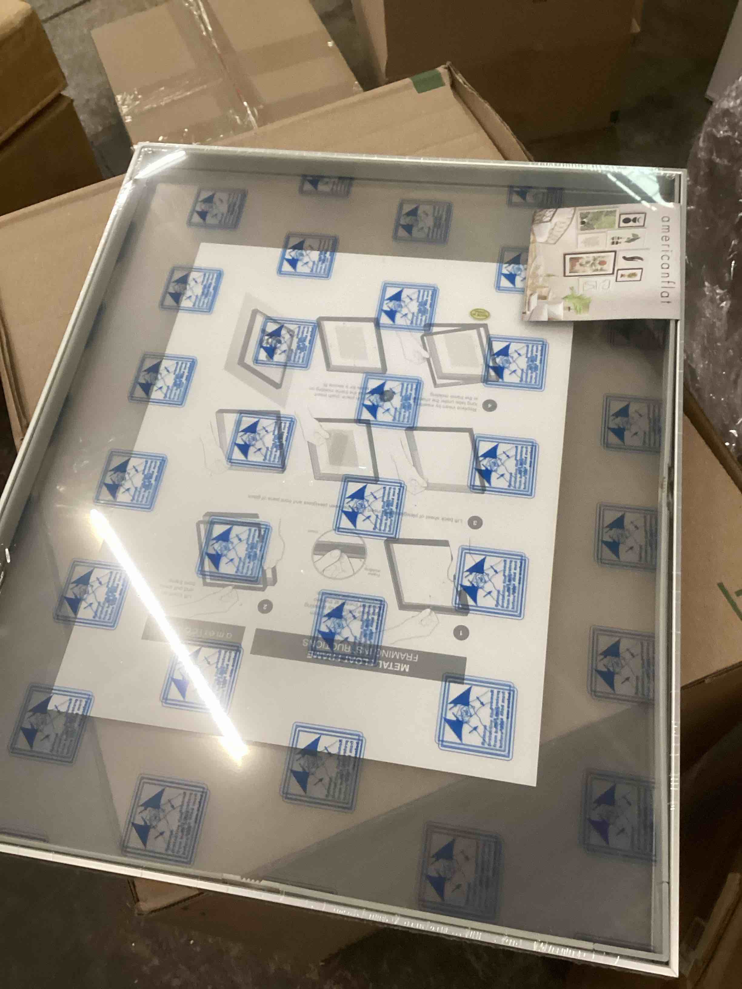 Condition photo showing New/Like New for Americanflat Aluminum 16x20 Floating Picture Frame with Shatter-Resistant Glass - Use as 11x14 Picture Frame or Display 16x20 Photo - Signature Float Collection - Photo Frames for Wall - Silver Silver 16X20 1 Pack