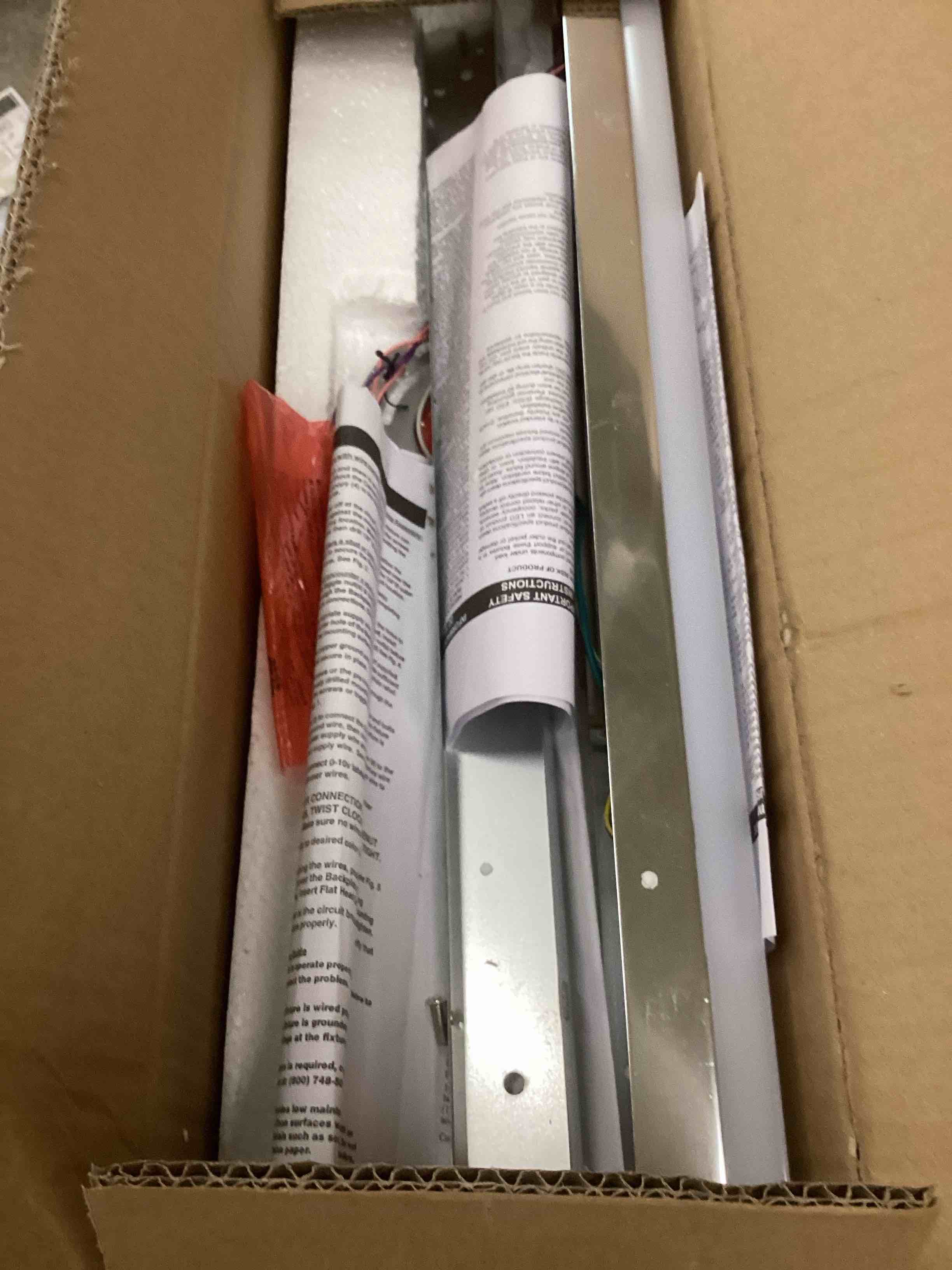 Condition photo showing As Is for Lithonia Lighting 24-Inch LED Vanity Light with 3-in-1 Switchable White Color Temperature, Contemporary Square Bathroom Vanity Wall Light Fixture for Over The Mirror, Polished Chrome 24-Inch Square Chrome