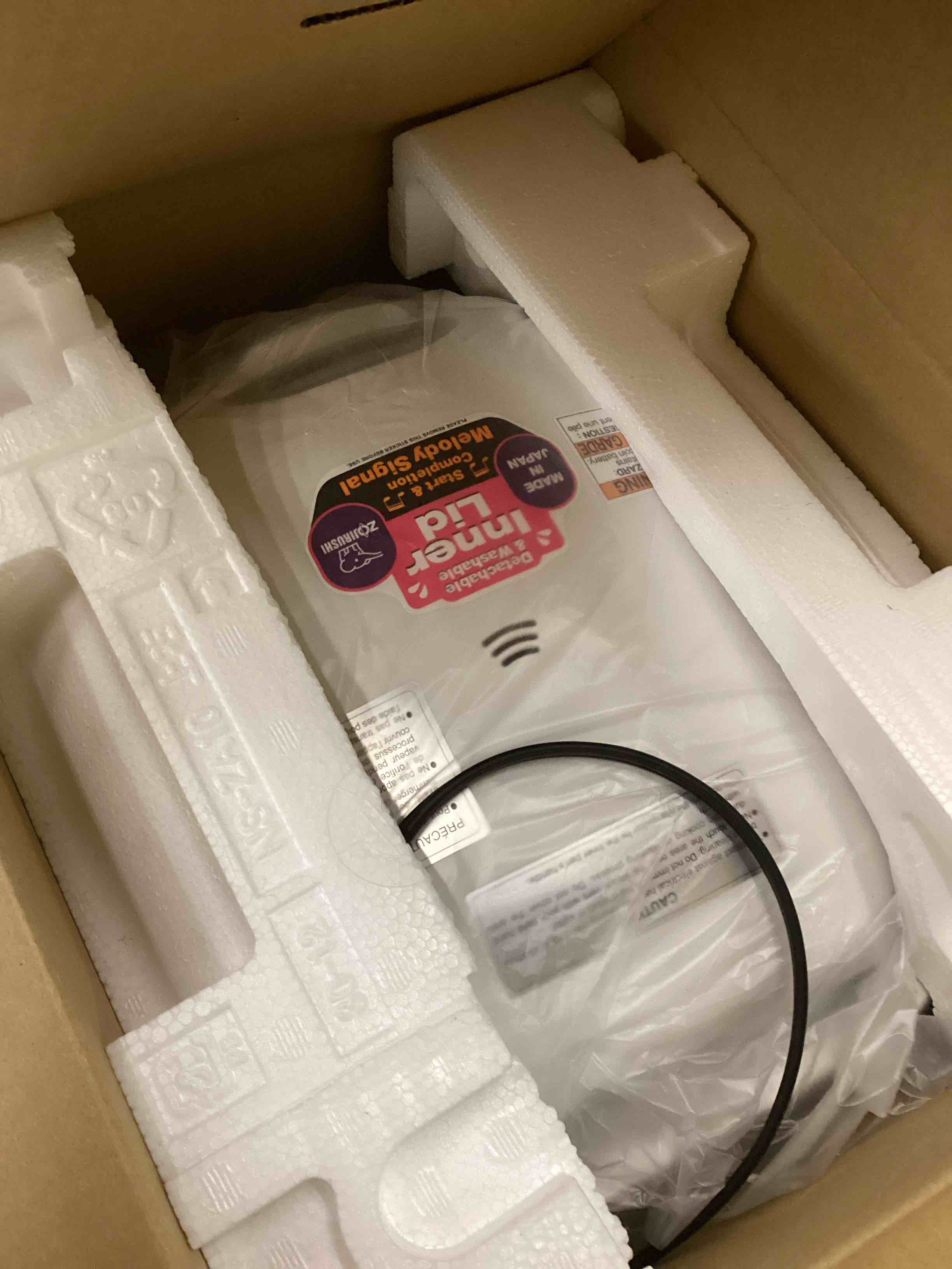 Condition photo showing New/Like New for Zojirushi NS-ZCC10 5-1/2-Cup Neuro Fuzzy Rice Cooker and Warmer, Premium White 5.5-Cup uncooked rice