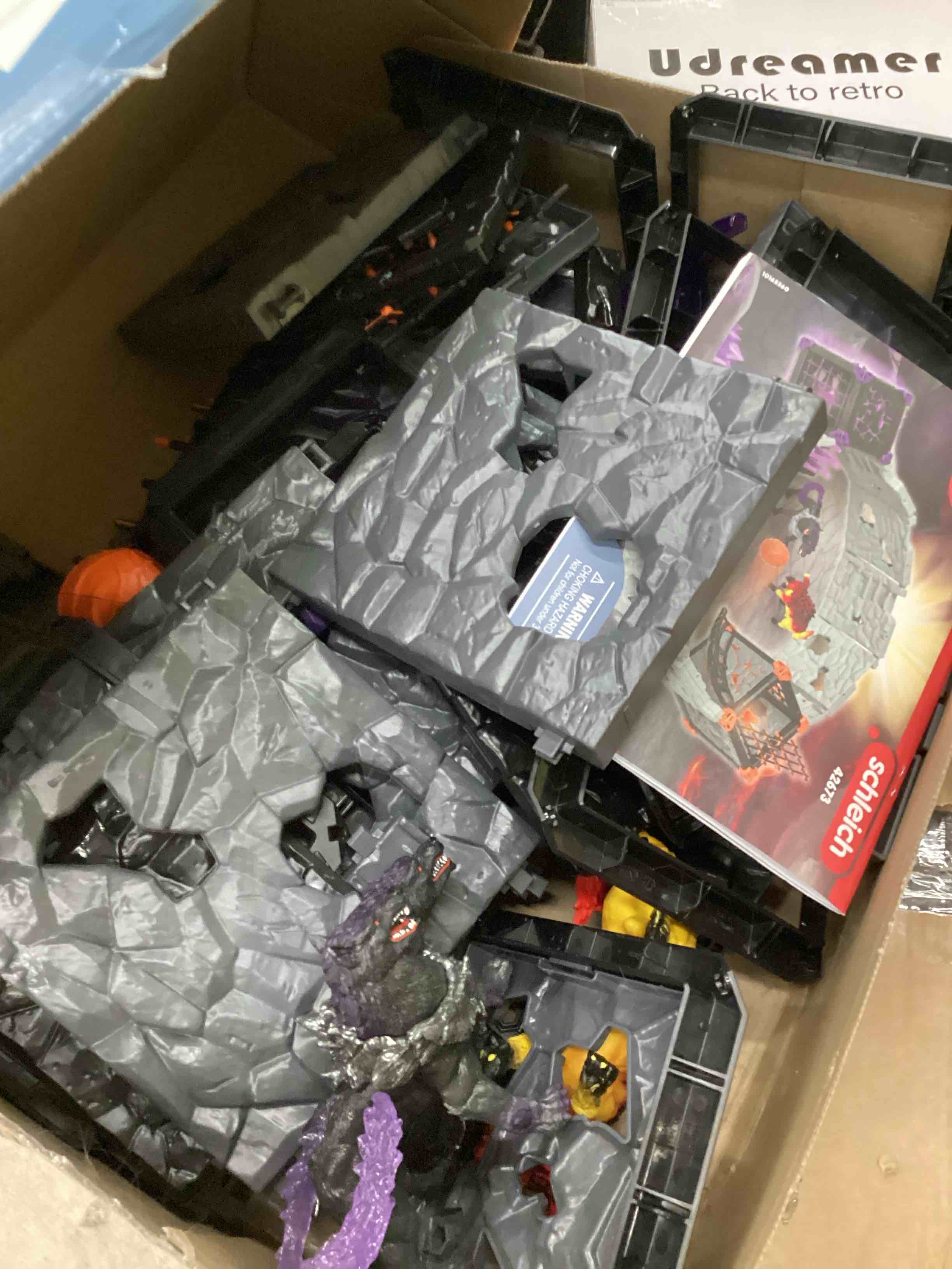 Condition photo showing As Is for Schleich Eldrador Creatures - 71 PC BattleCave Arena Lava Vs. Shadow Playset - Interactive Lava Bull and Shadow Hound Set - Animal Monster Figurines for Boys and Girls - Toys for Kids Ages 7+ | 42673 Lava Bull vs. Shadow Hound