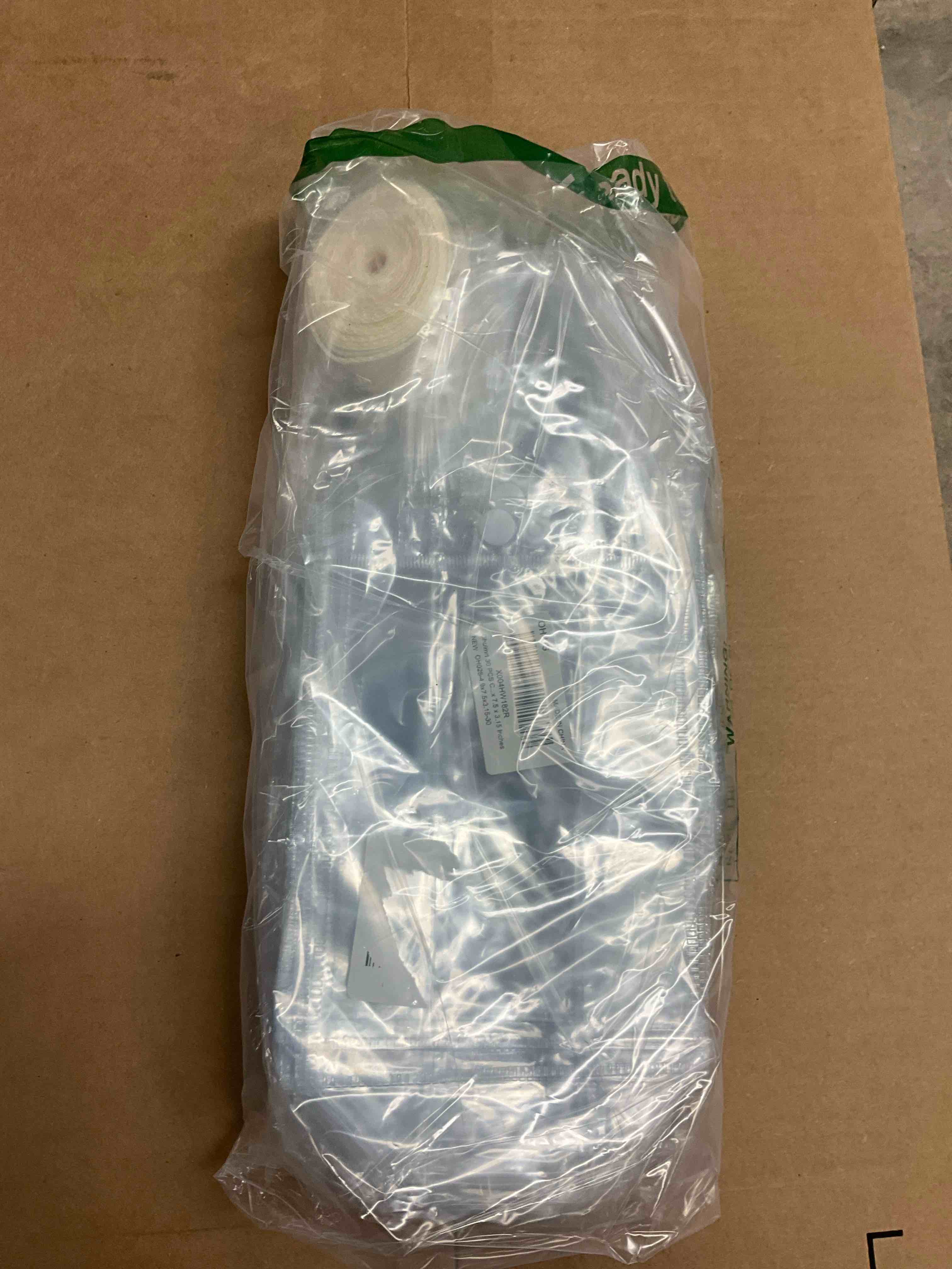 Condition photo showing New/Like New for Ohuimrt 30 PCS Clear Plastic Gift Bags with Handles, Reusable Party Favor Bags with Ribbon Transparent Gift Wrap Bags Bulk for Weddings Birthdays, 4.9 x 7.5 x 3.15 Inches Clear 4.9 x 7.5 x 3.15 1 Count (Pack of 30)