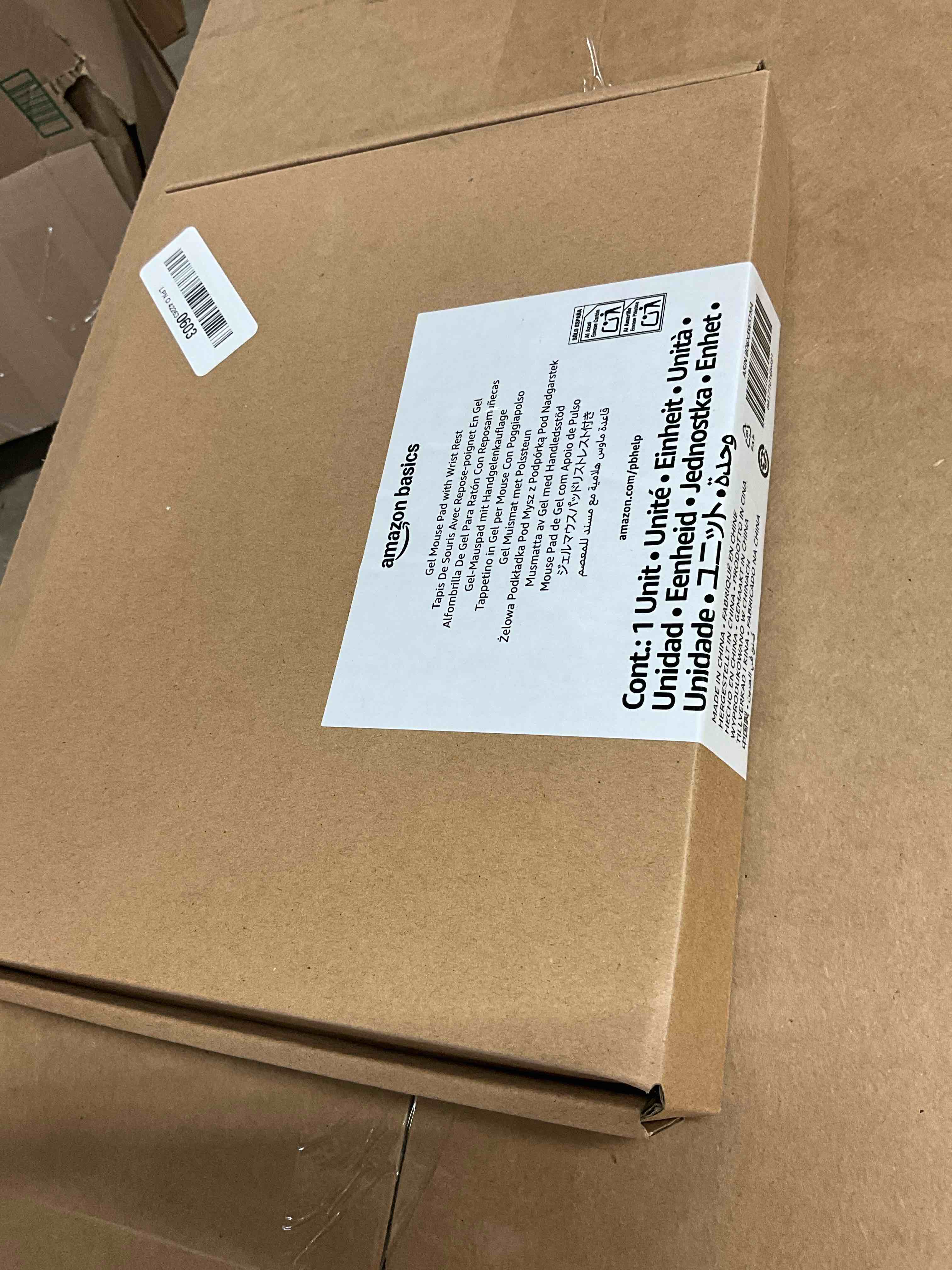 Condition photo showing New/Like New for Amazon Basics Irregular Ergonomic Gel Computer Mouse Pad with Wrist Rest for Pain Relief, 10.1L x 8.1W inches, Black Single