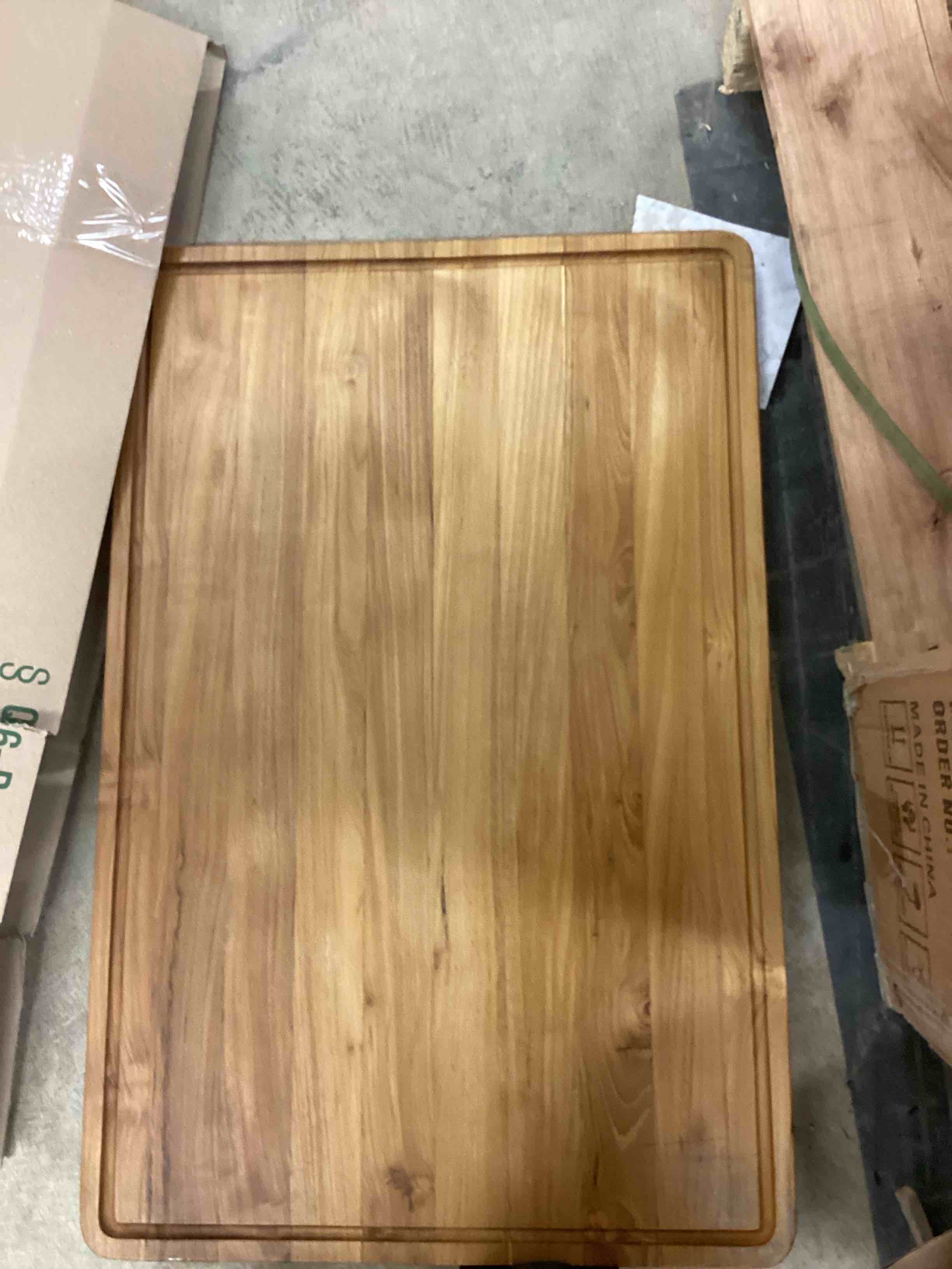 Condition photo showing New/Like New for 30" x 20" XXXL Teak Wood Cutting Board | Extra Large Size Wooden Butcher Block for Chopping Meat & Turkey, Serve Charcuterie & Cheese | Built-In Juice Groove & Handle