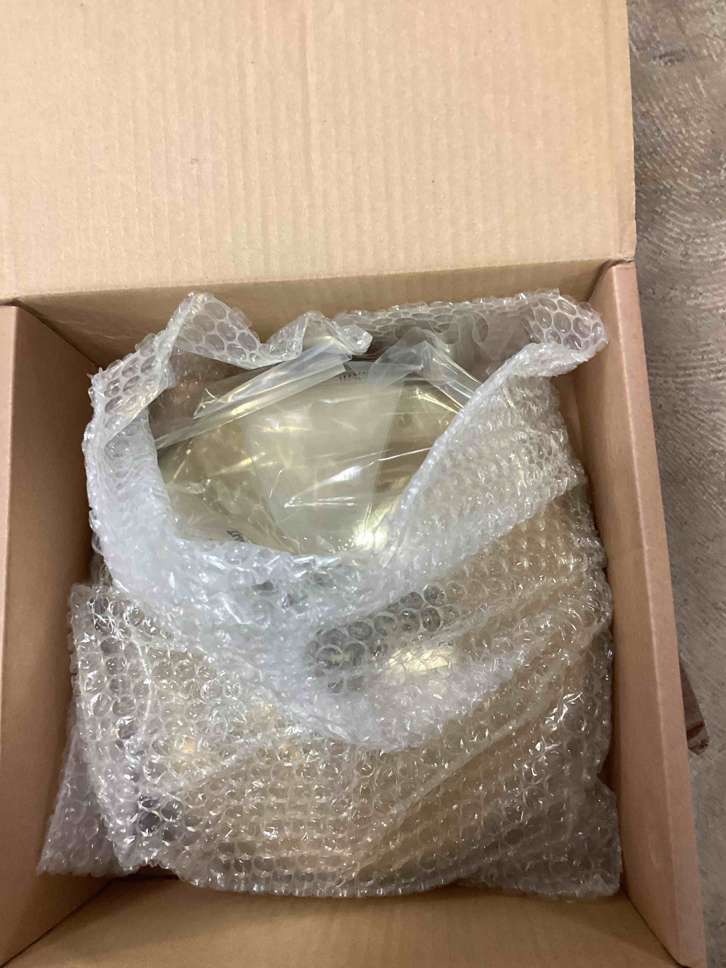 Condition photo showing New/Like New for Kingston Brass K225K22 Shower Scape 10-Inch Round Raindrop Brass Shower Head with 17-Inch Ceiling Mounted Shower Arm in Polished Brass