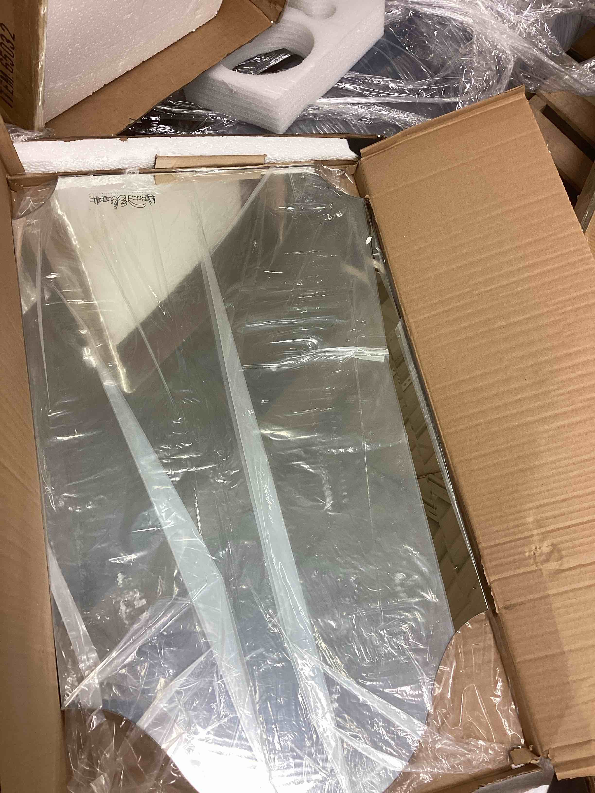 Condition photo showing New/Like New for Howard Elliott Frameless Arched Wall Mirror