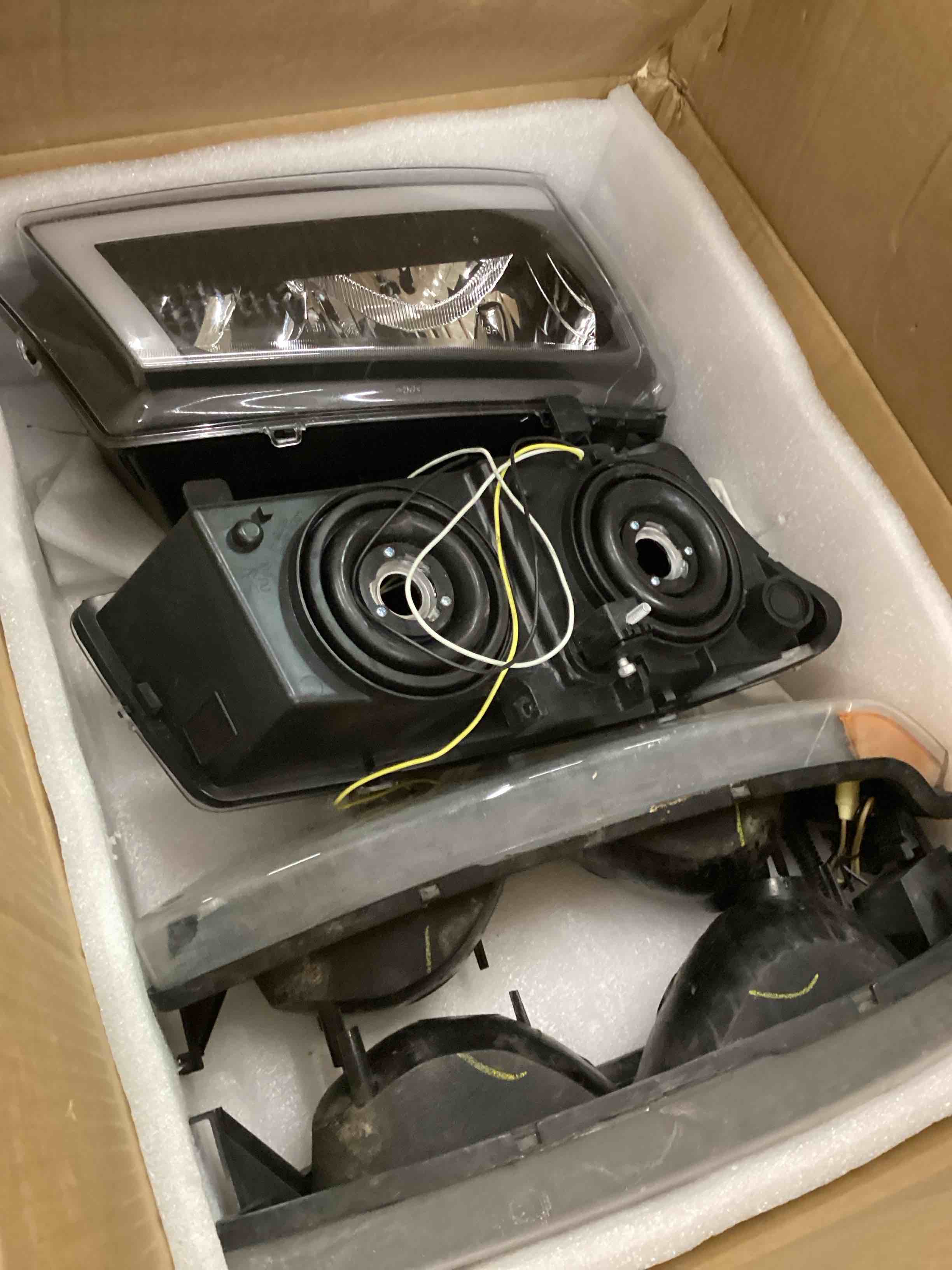 Condition photo showing As Is for Headlight Assembly Compatible with 2003-2006 Chevy Avalanche/2003-2007 Chevrolet Silverado 1500 2500 3500 Headlamp w/Bulb with Black Housing/Clear Lens/Clear Cornor Black/Clear/Clear Led Sequential Turn+ DRL