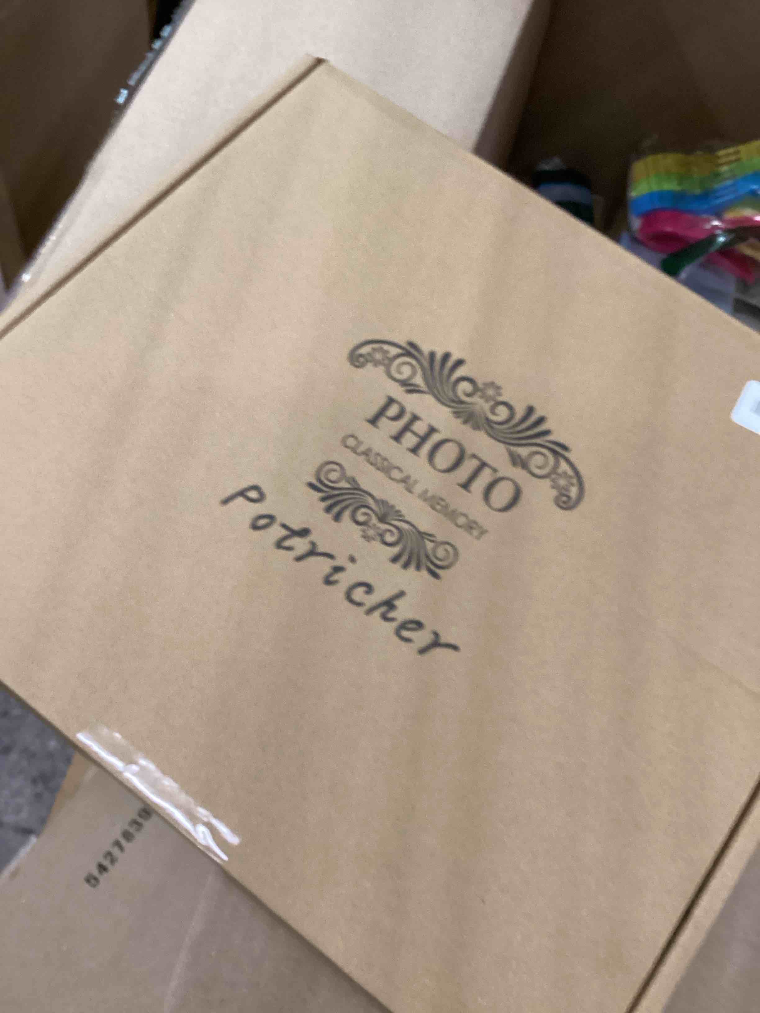 Condition photo showing New/Like New for potricher Linen Hardcover Photo Album 4x6 600 Photos Large Capacity for Family Wedding Anniversary Baby Vacation (Brown, 600 Pockets) 600 Pockets Brown