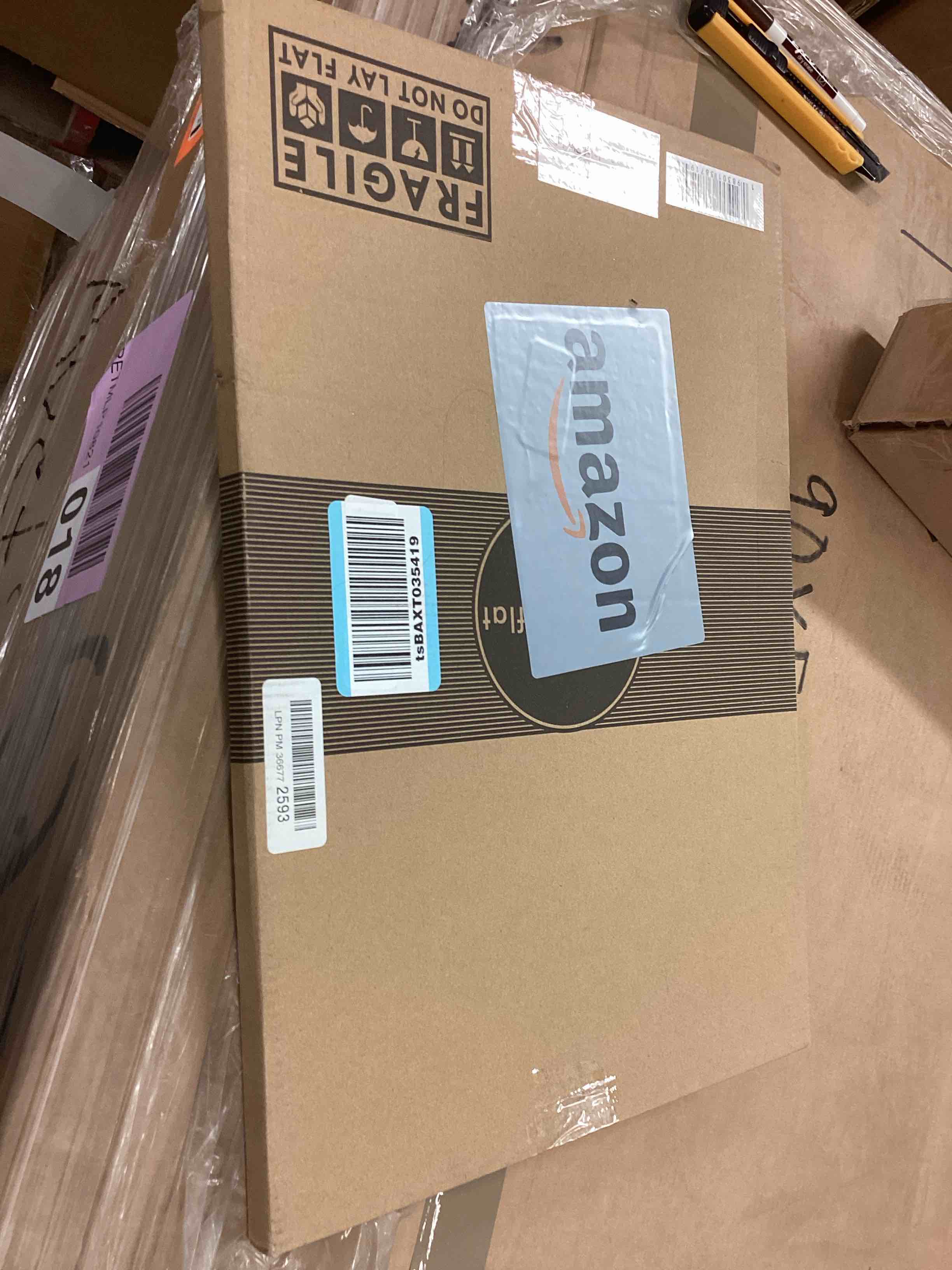 Condition photo showing Good Condition for Americanflat 12x18 Poster Frame with Polished Front Cover - Slide-In Photo Frame with Buildable Molding - Fusion Collection - Picture Frames for Wall Display - Black 1 Pack 12x18 Black