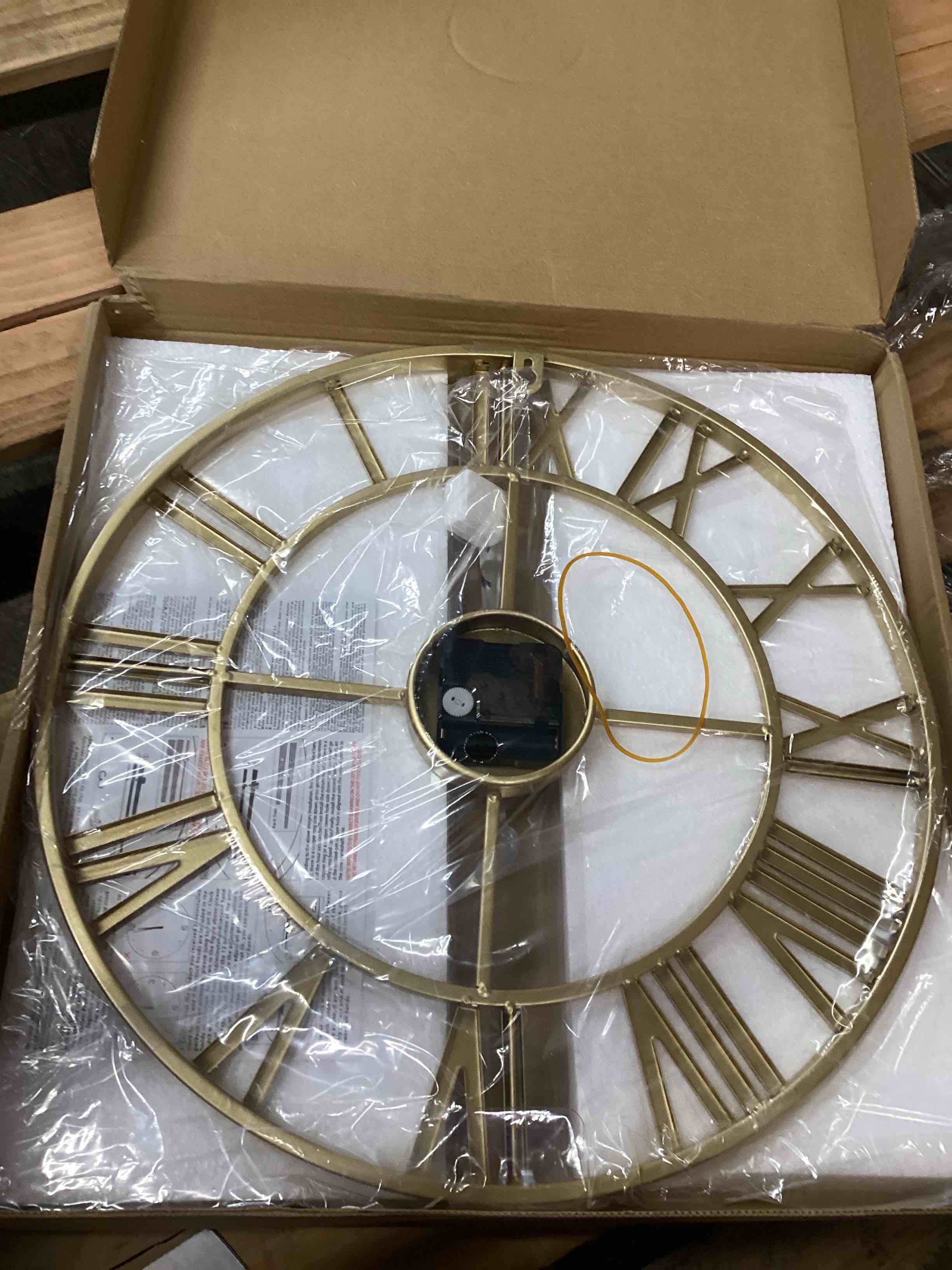 Condition photo showing Good Condition for Cuspin Gold Wall Clock 16 Inch Metal Decorative Clock for Living Room, Battery-Operated Completely Silent Non Ticking Round Modern Wall Clock -Roman Number Gold Roman Number 16 Inch