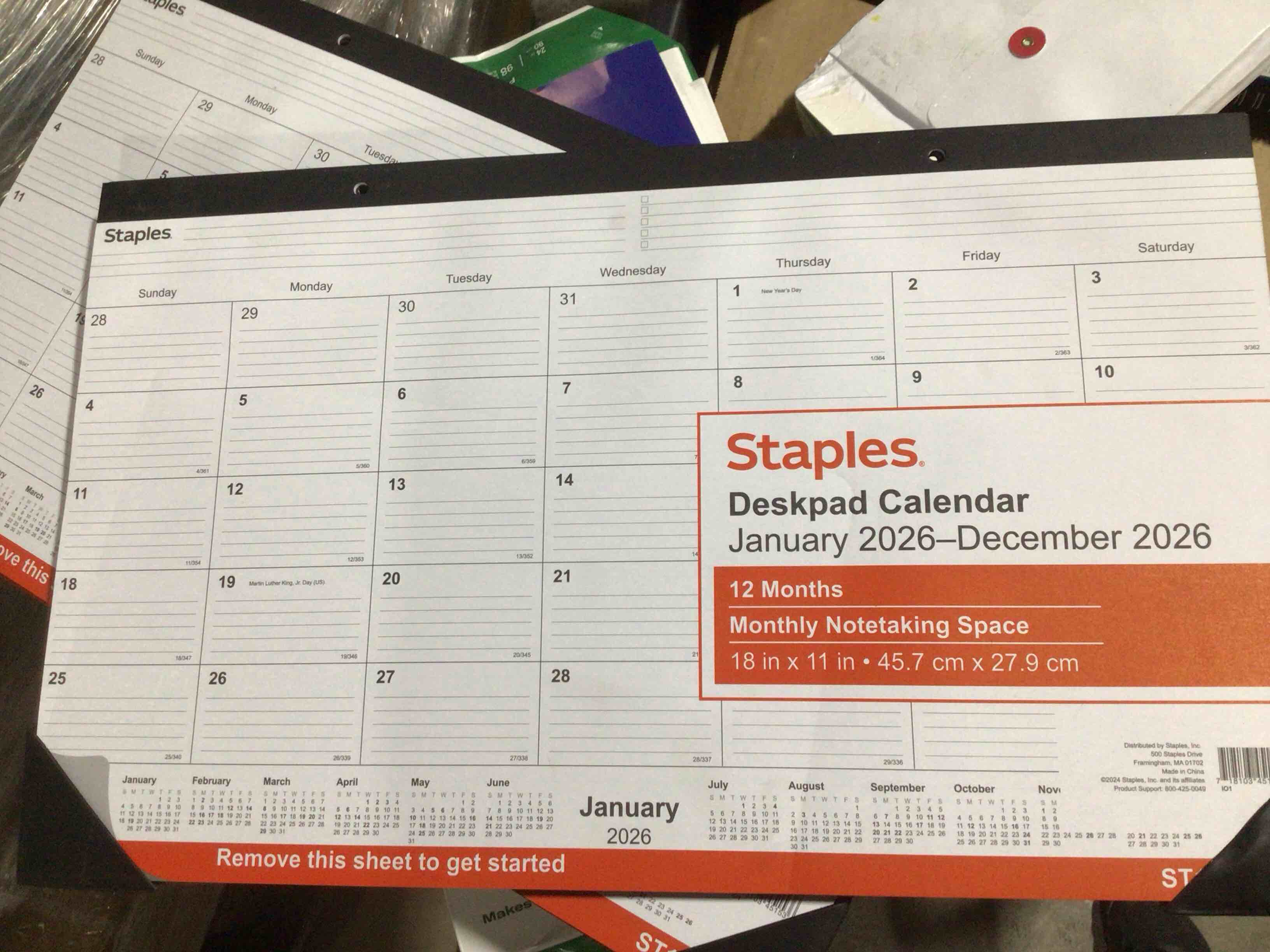 Condition photo showing New/Like New for Pack of 4 2026 Staples 18" x 11" Monthly Desk Pad Calendar White/Black (ST17392-26)