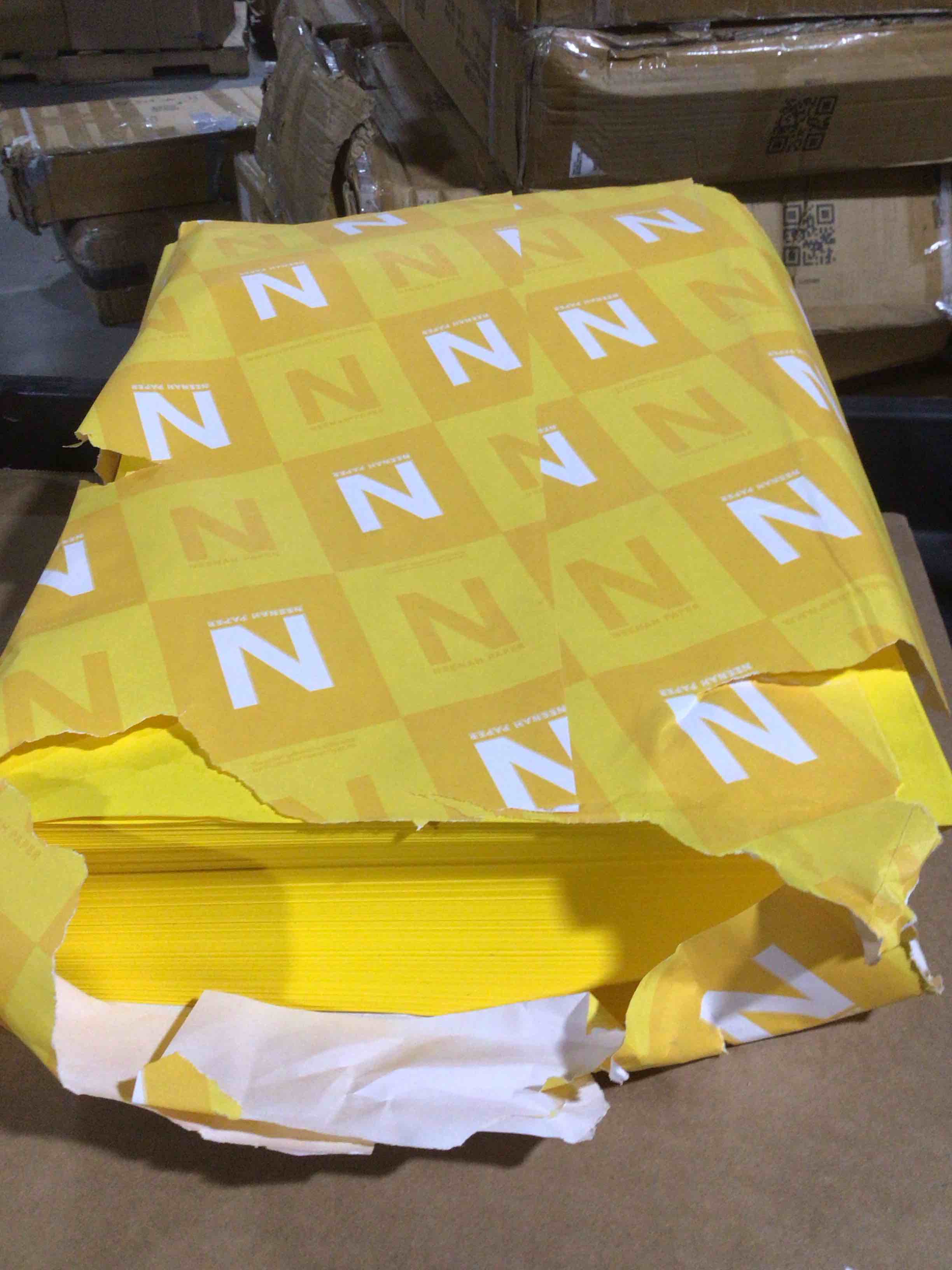 Condition photo showing item condition for Wausau Paper 22533 Multipurpose Colored Paper  24lb  11 x 17  Solar Yellow  500 Sheets/Ream